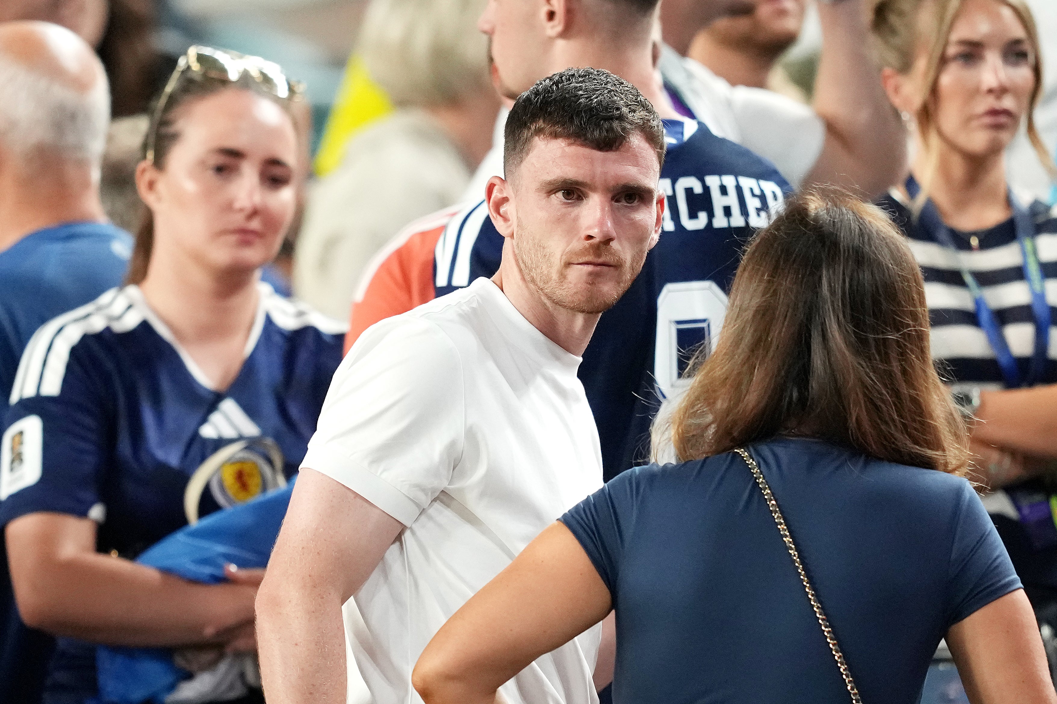 Scotland's Andrew Robertson (left) and family after the game