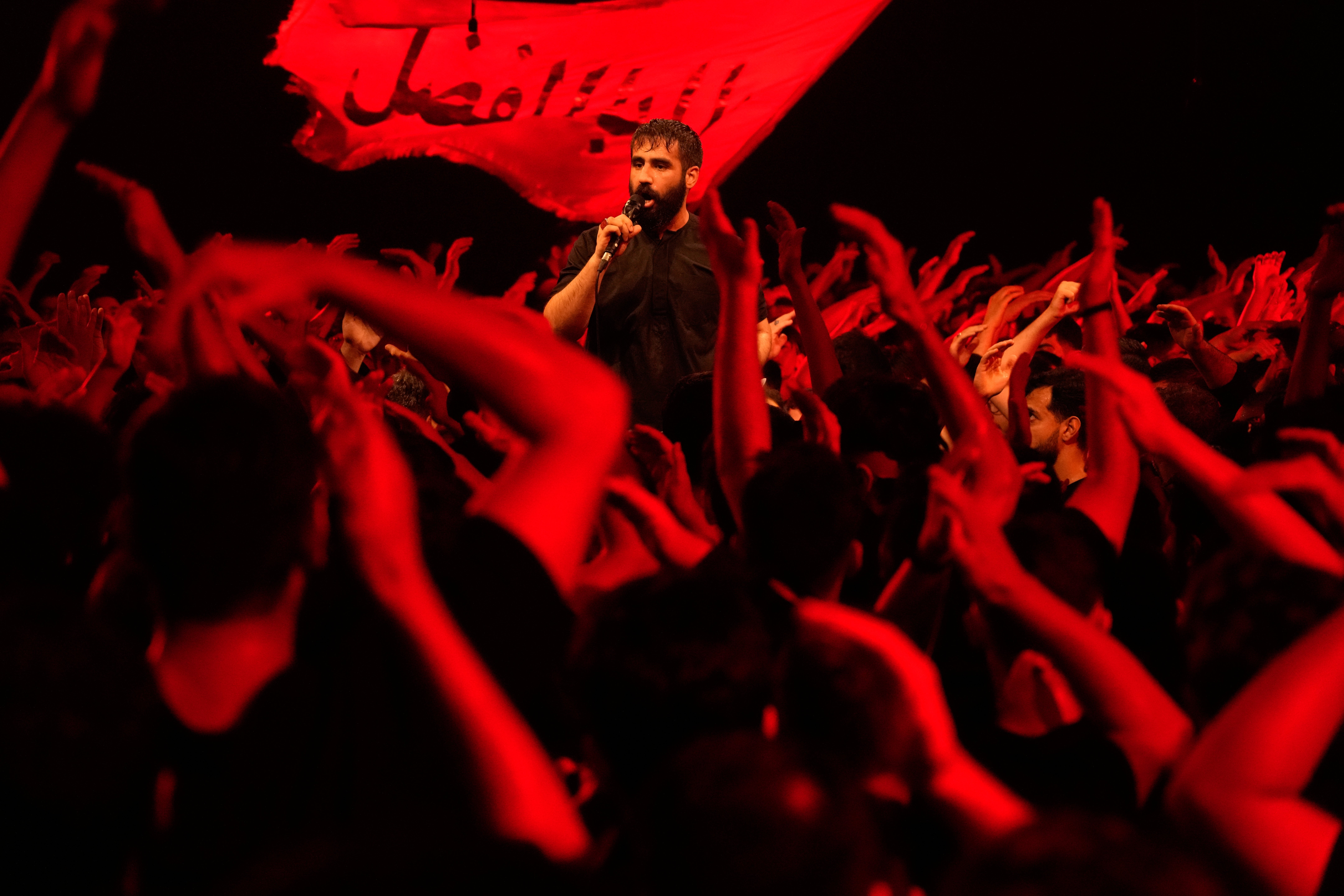 Iranians attend a mourning ceremony in Tehran.