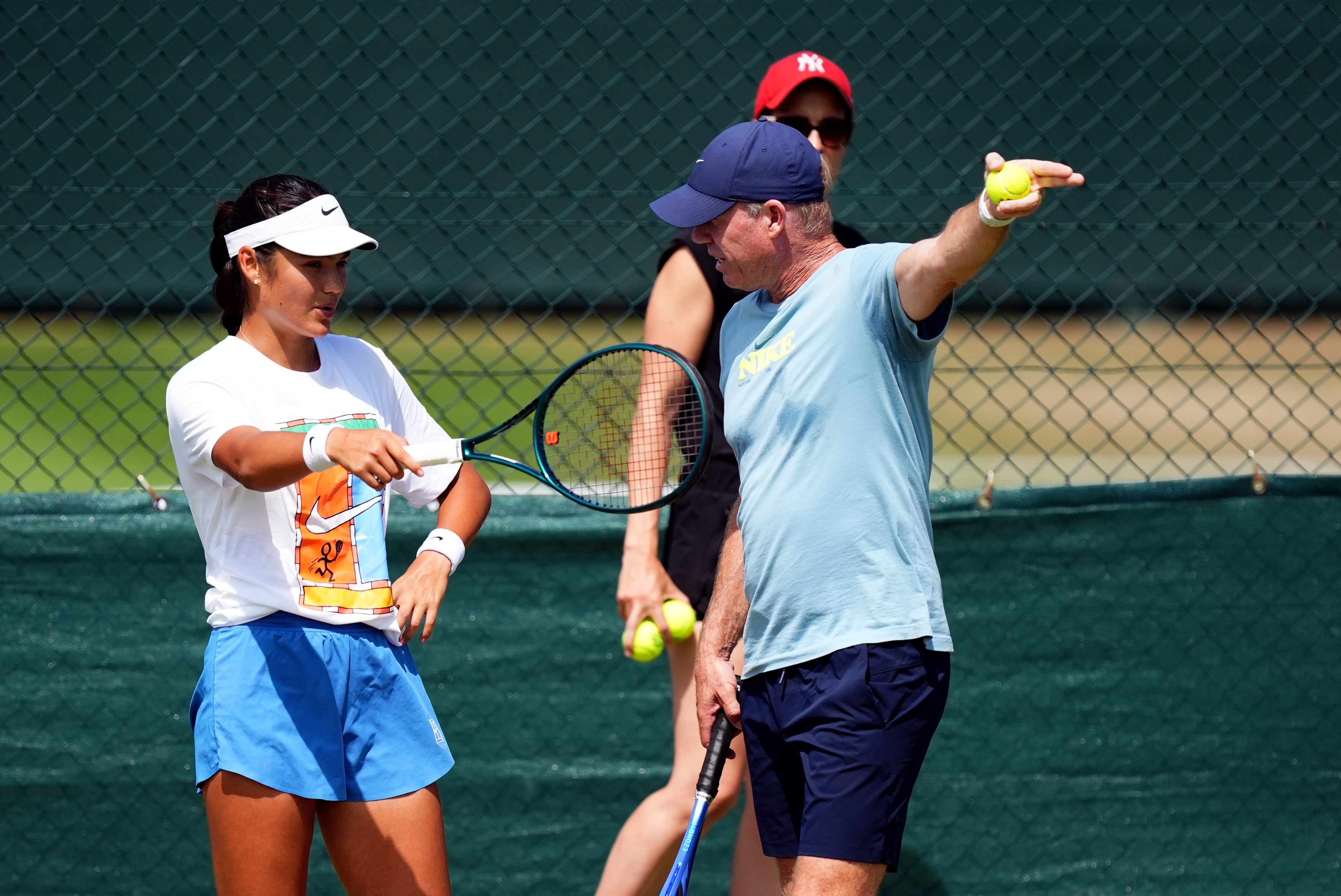 Mark Petchey, right, coaches Emma Raducanu (Mike Egerton/PA)