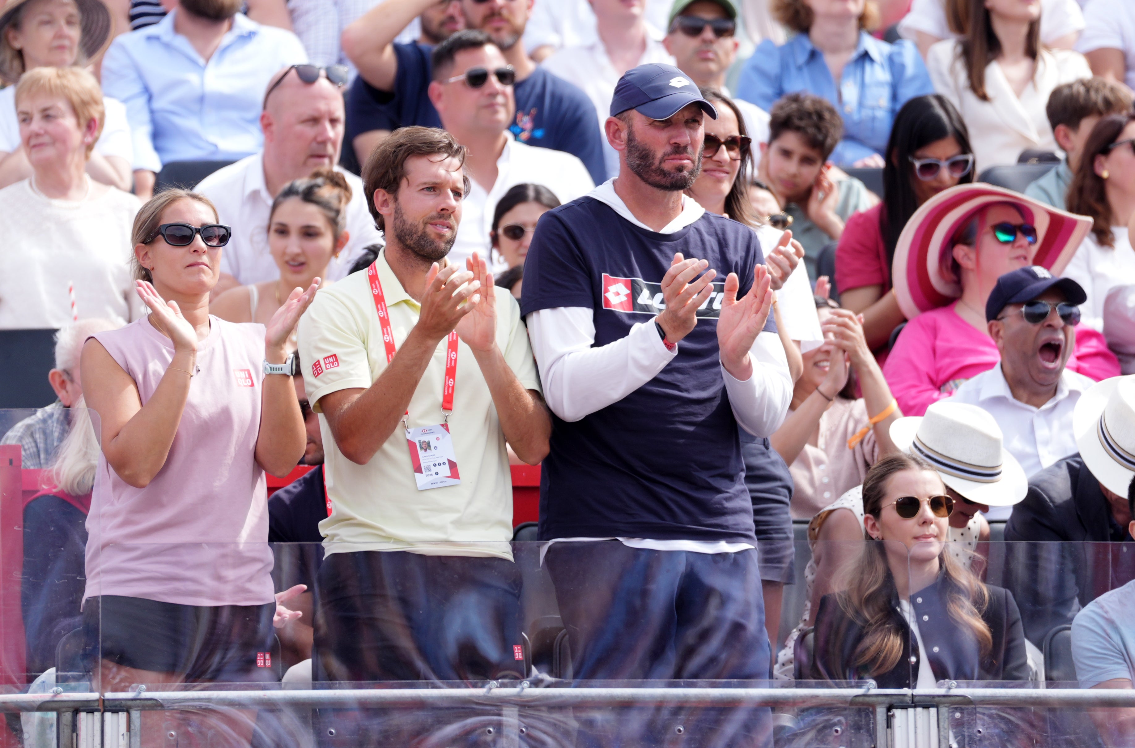 Andrew Richardson, centre, is back working with Emma Raducanu (Adam Davy/PA)