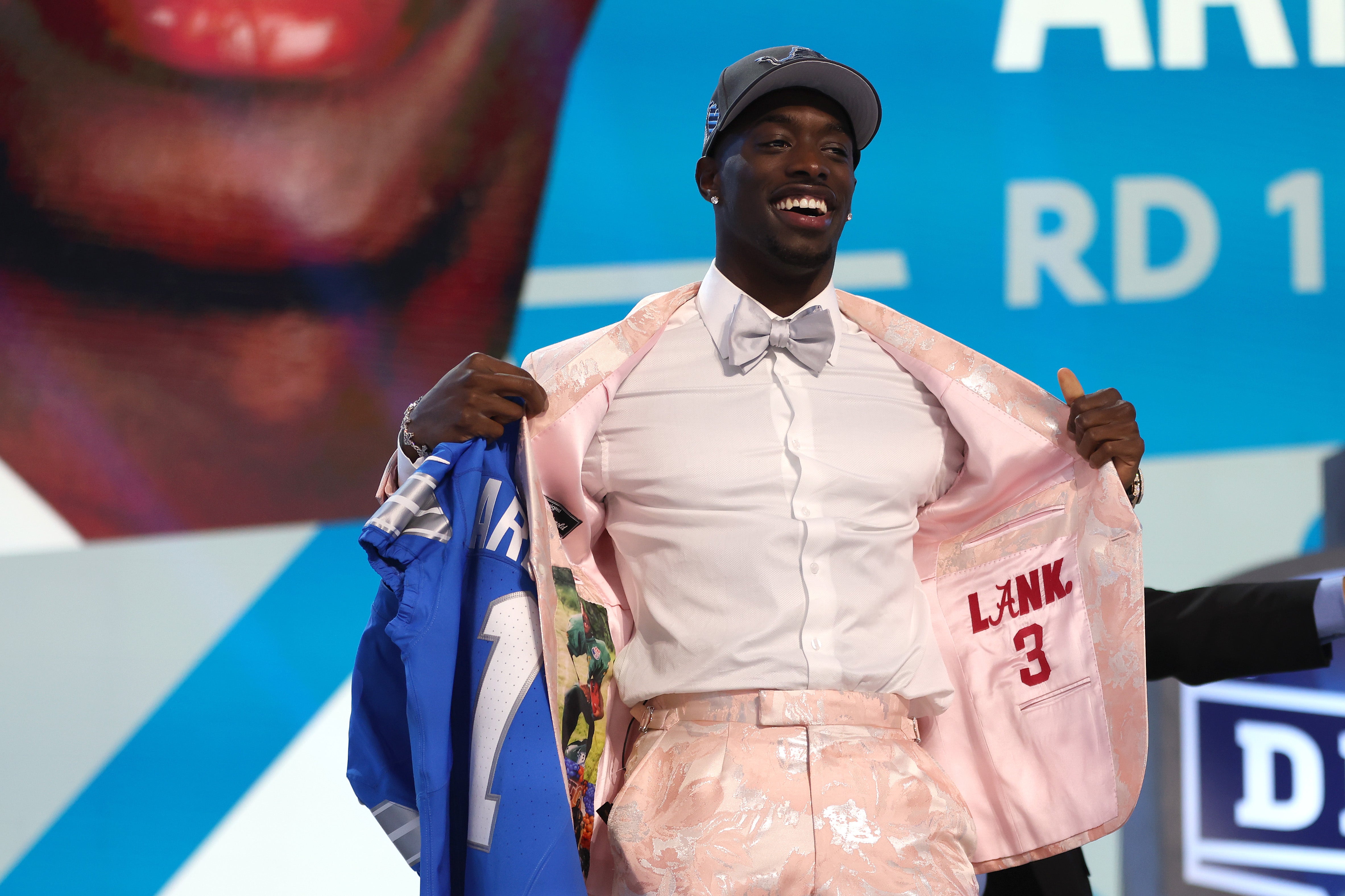 Arnold celebrates after being selected 24th overall by the Detroit Lions during the first round of the 2024 NFL Draft