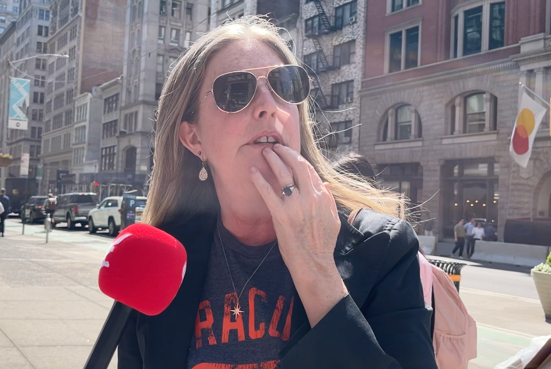 Christy, a woman walking down Fifth Avenue, called 262 Fifth Avenue an 'abomination' and railed against the building for obscuring the view of the Empire State Building (Zack Palomo / The Independent)