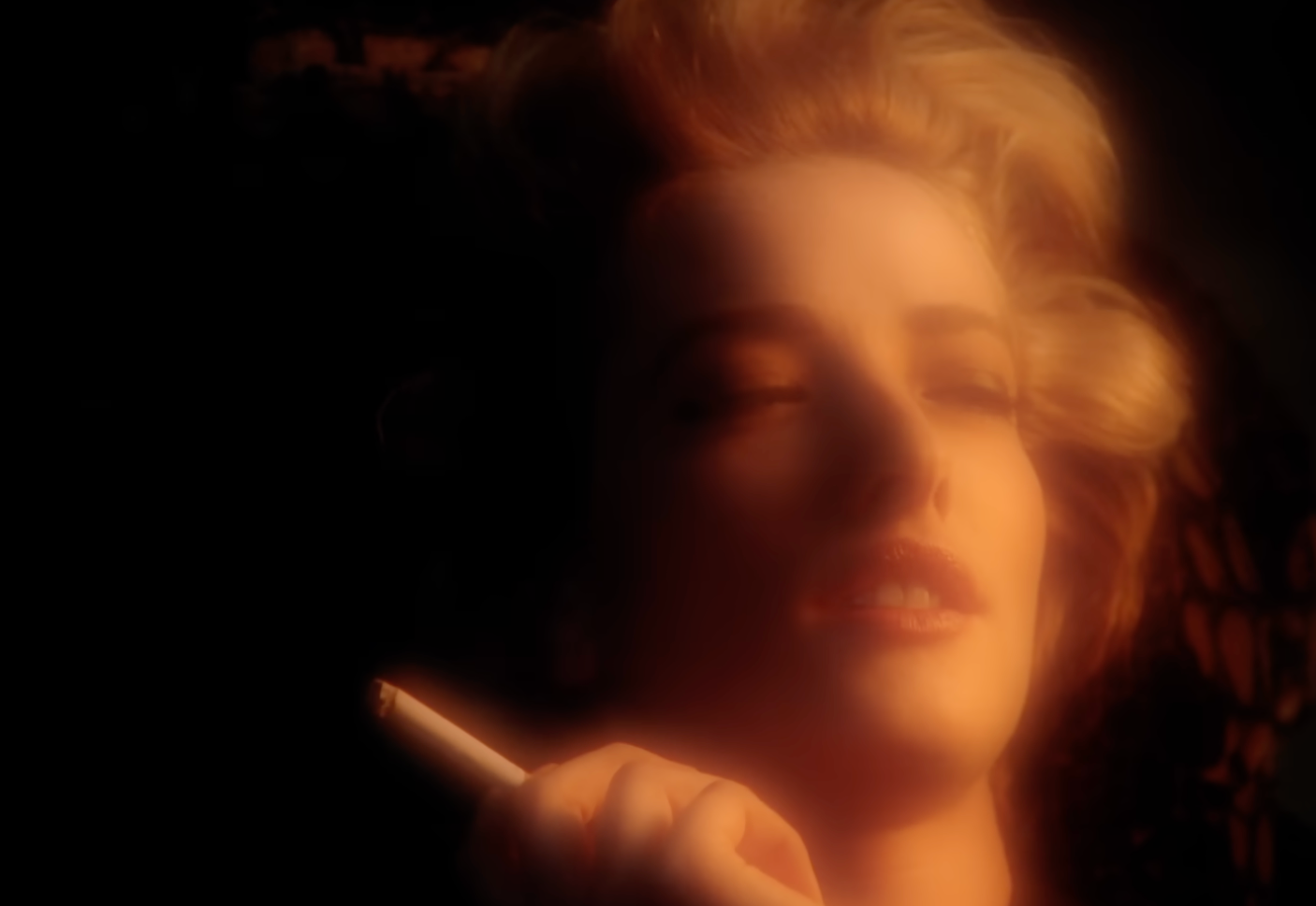 Freedom: Linda Evangelista lights one up in the George Michael music video (Columbia Records)