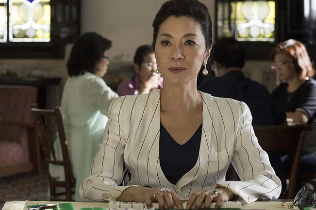 Malaysian actor Michelle Yeoh playing mahjong in ‘Crazy Rich Asians’