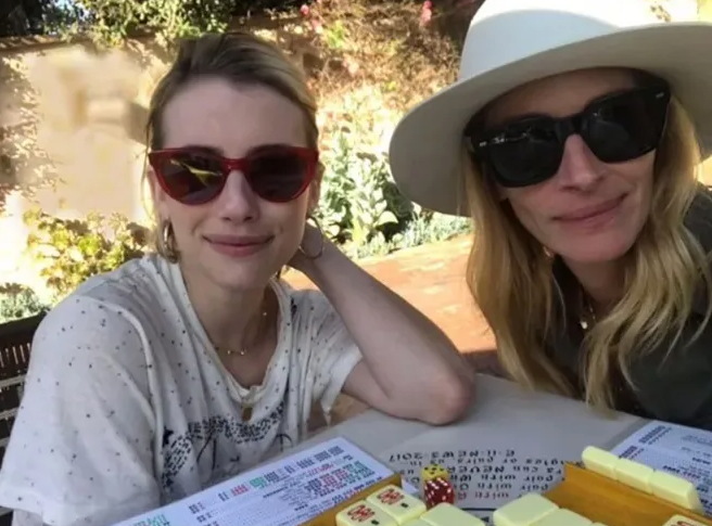 Emma Roberts and Julia Roberts playing mahjong