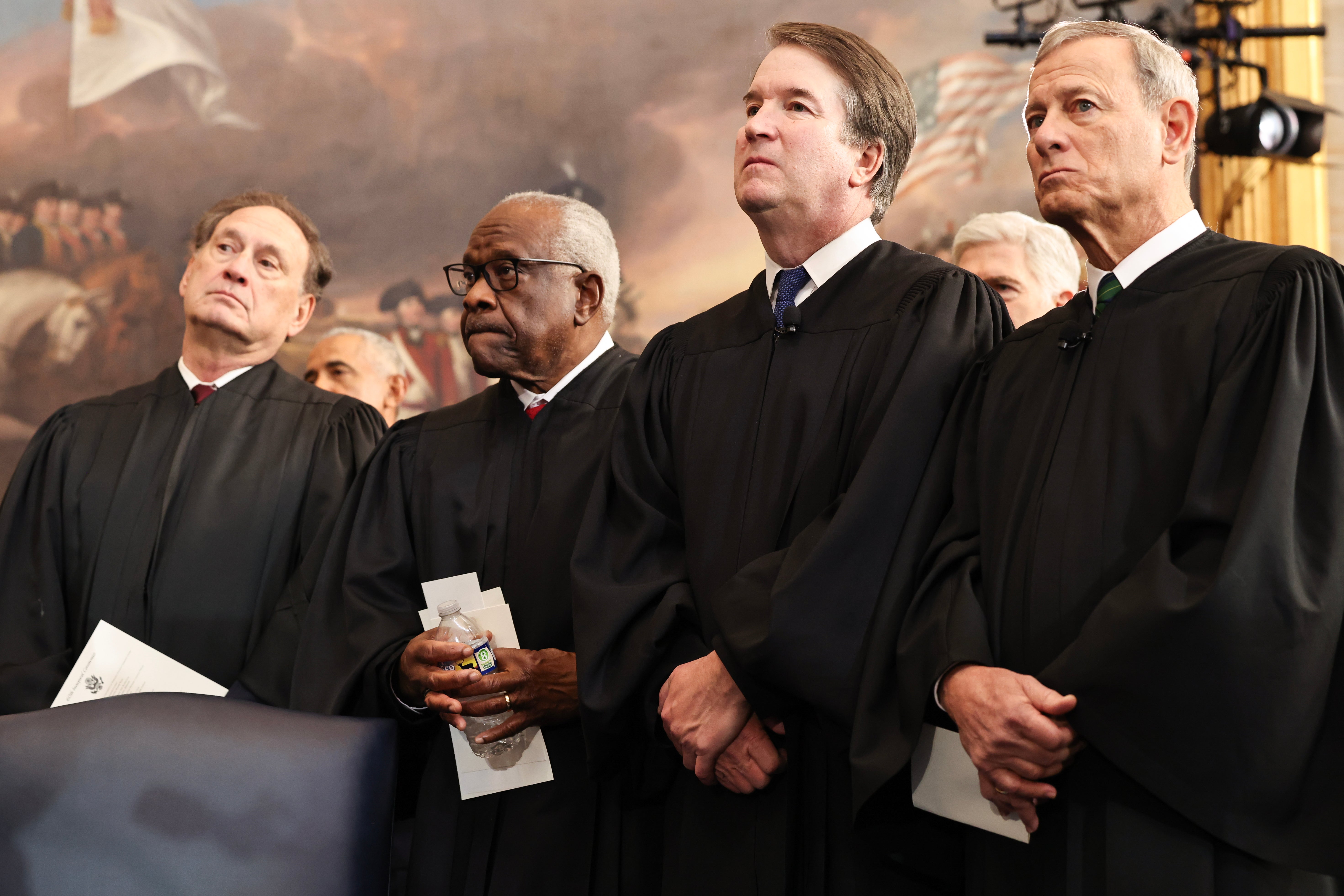 U.S. Associate Supreme Court Justices Samuel Alito, Jr., Clarence Thomas and Brett Kavanaugh and U.S. Supreme Court Chief Justice John Roberts look on during inauguration ceremonies in the Rotunda of the U.S. Capitol on January 20, 2025