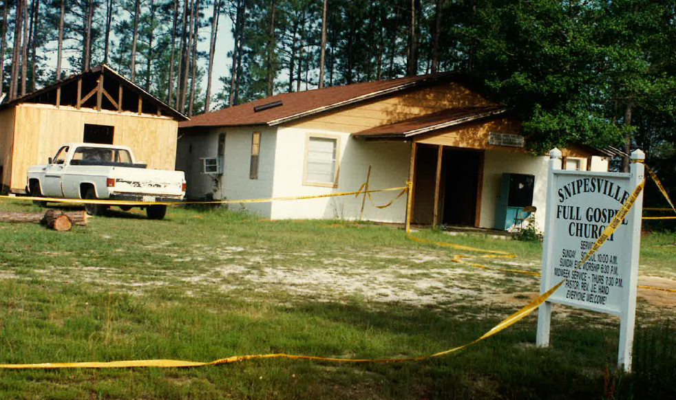 On June 1, 1996, deputies from the local sheriff’s office found Hand’s body with multiple gunshot wounds on the roof of the Full Gospel Church of Snipesville, according to state investigators