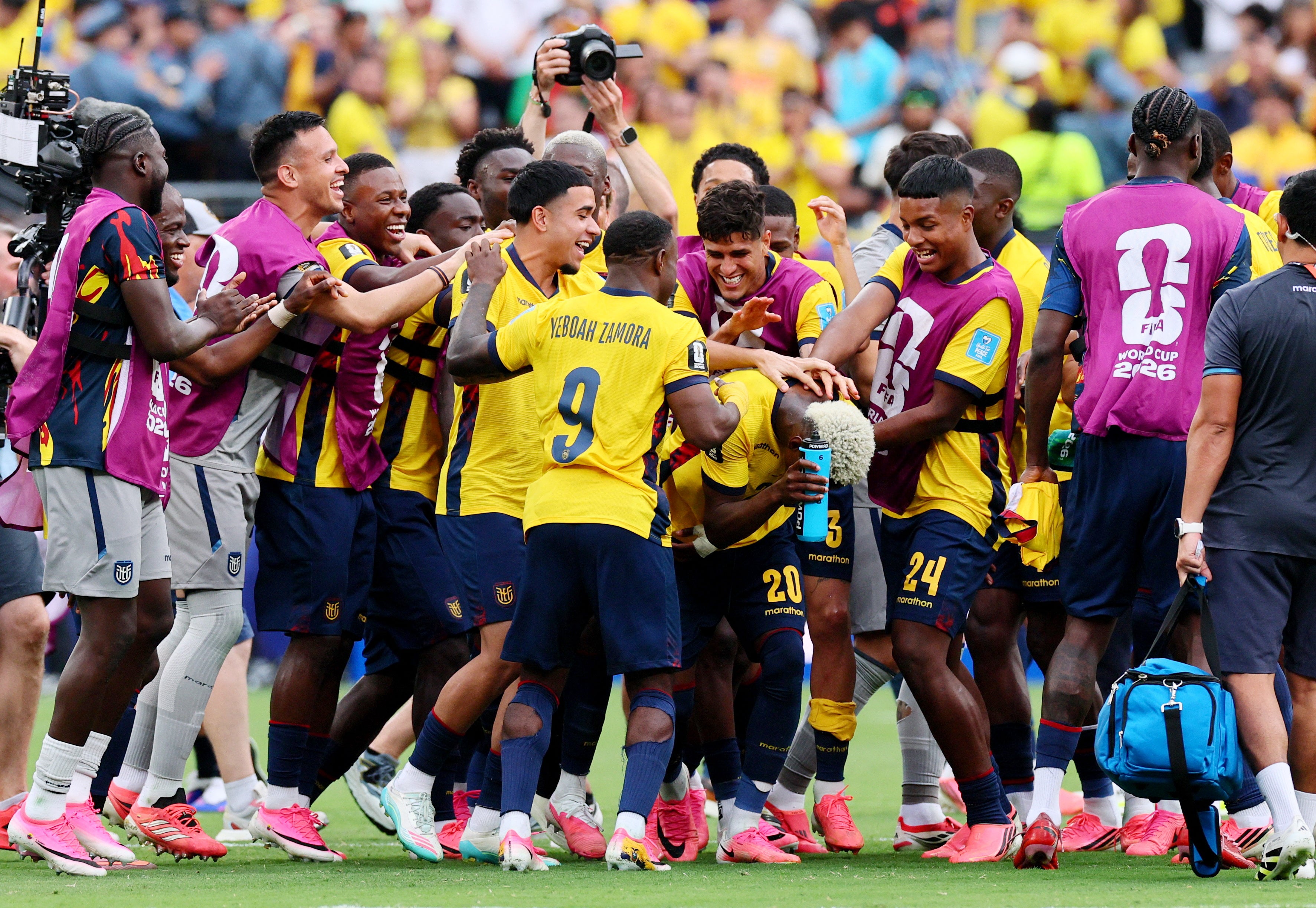 Ecuador's Nilson Angulo celebrates with teammates after the match