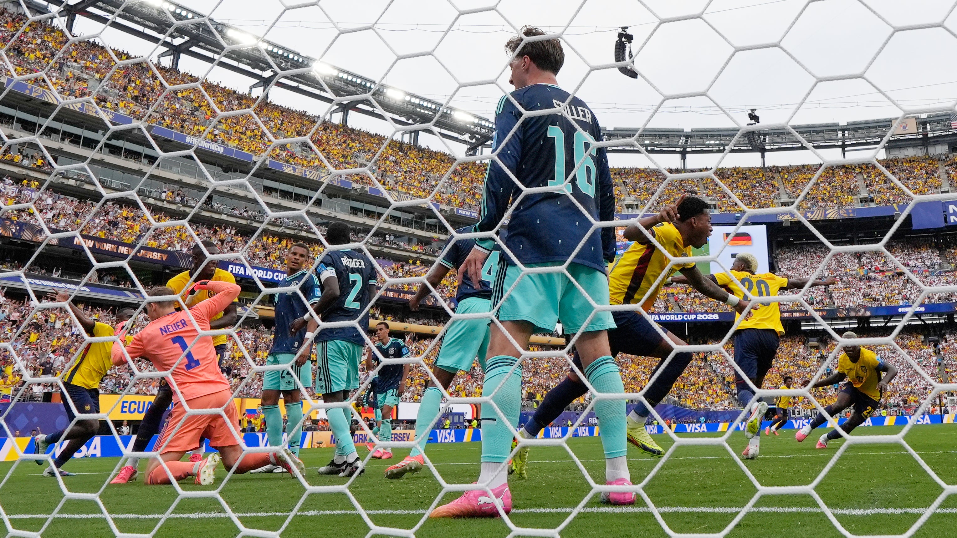 Ecuador's Gonzalo Plata (19), third from right, celebrates after scoring past Germany goalkeeper Manuel Neuer
