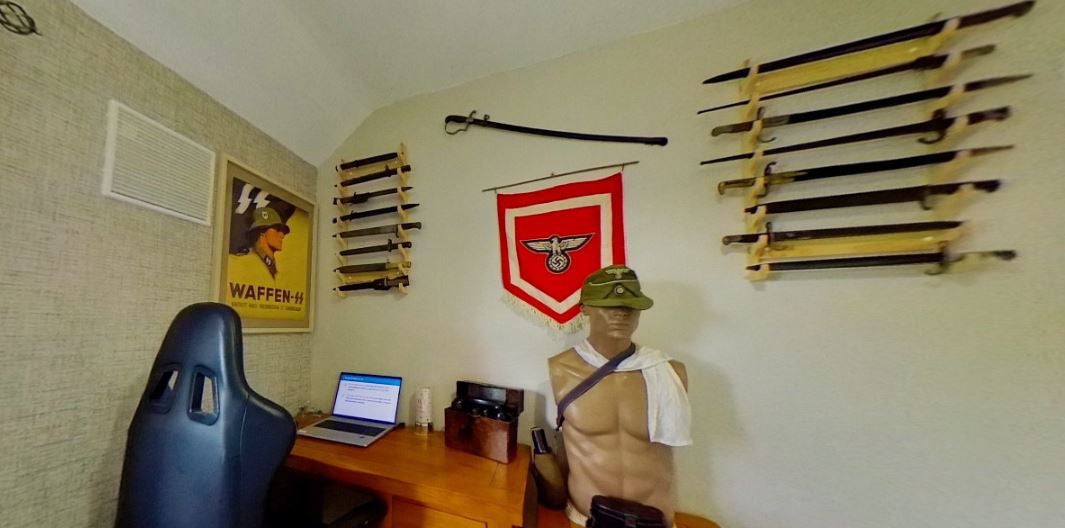 The collection included a 'Waffen SS' propaganda poster and a puppet decorated with Nazi paraphernalia.