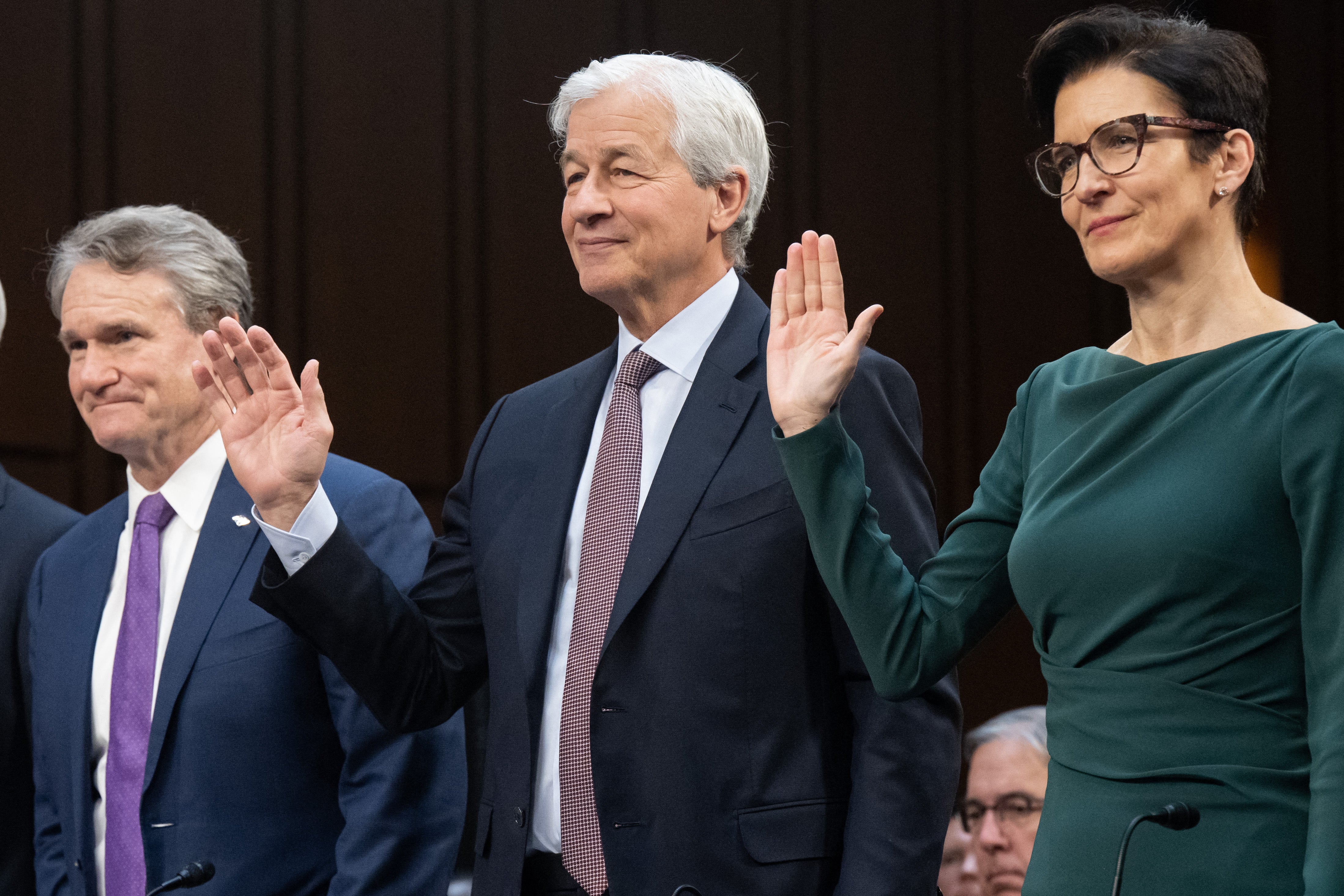 Bank of America Chairman and CEO Brian Thomas Moynihan (L) JPMorgan Chase Chairman and CEO Jamie Dimon (C) and Citigroup CEO Jane Fraser (R) are sworn-in to testify during a Wall Street oversight hearing by the Senate Banking, Housing, and Urban Affairs committee on Capitol Hill IN 2023