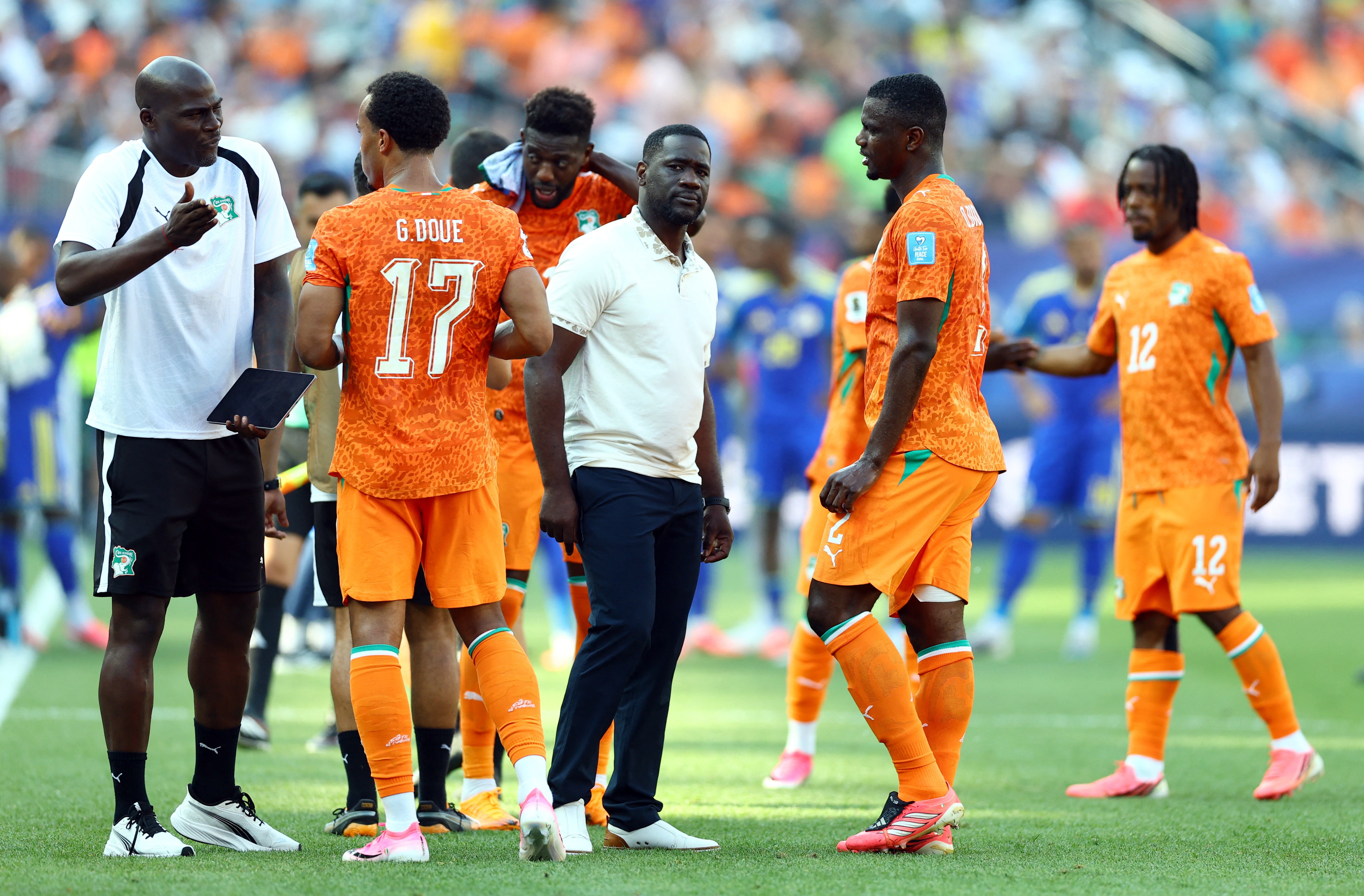 Emerse Fae with members of the Ivory Coast squad (Reuters)