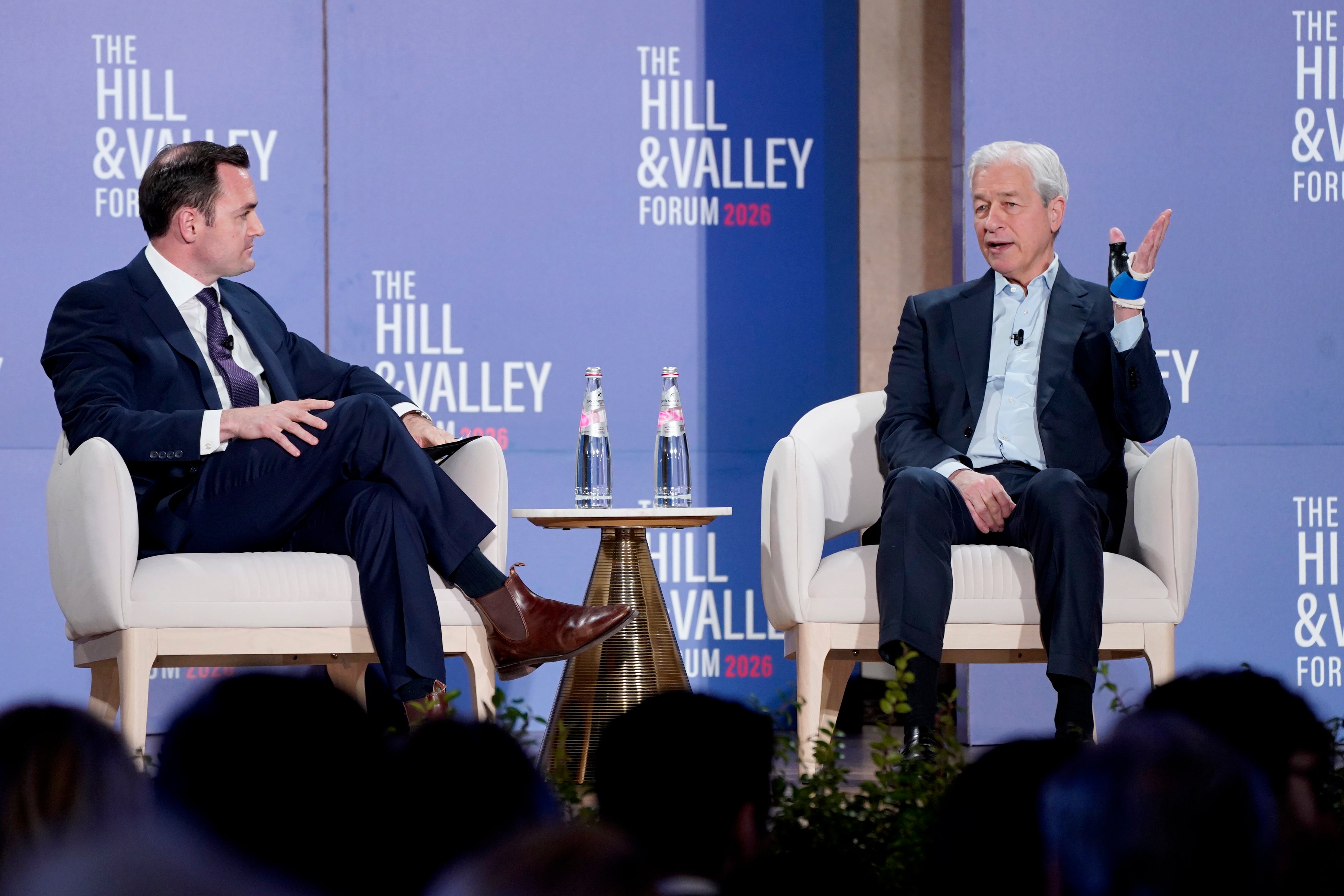 Mike Gallagher and Jamie Dimon participate in the Wealth, Power, and the Next American Century panel during The Hill & Valley Forum 2026 at Andrew W. Mellon Auditorium on March 24, 2026 in Washington, DC