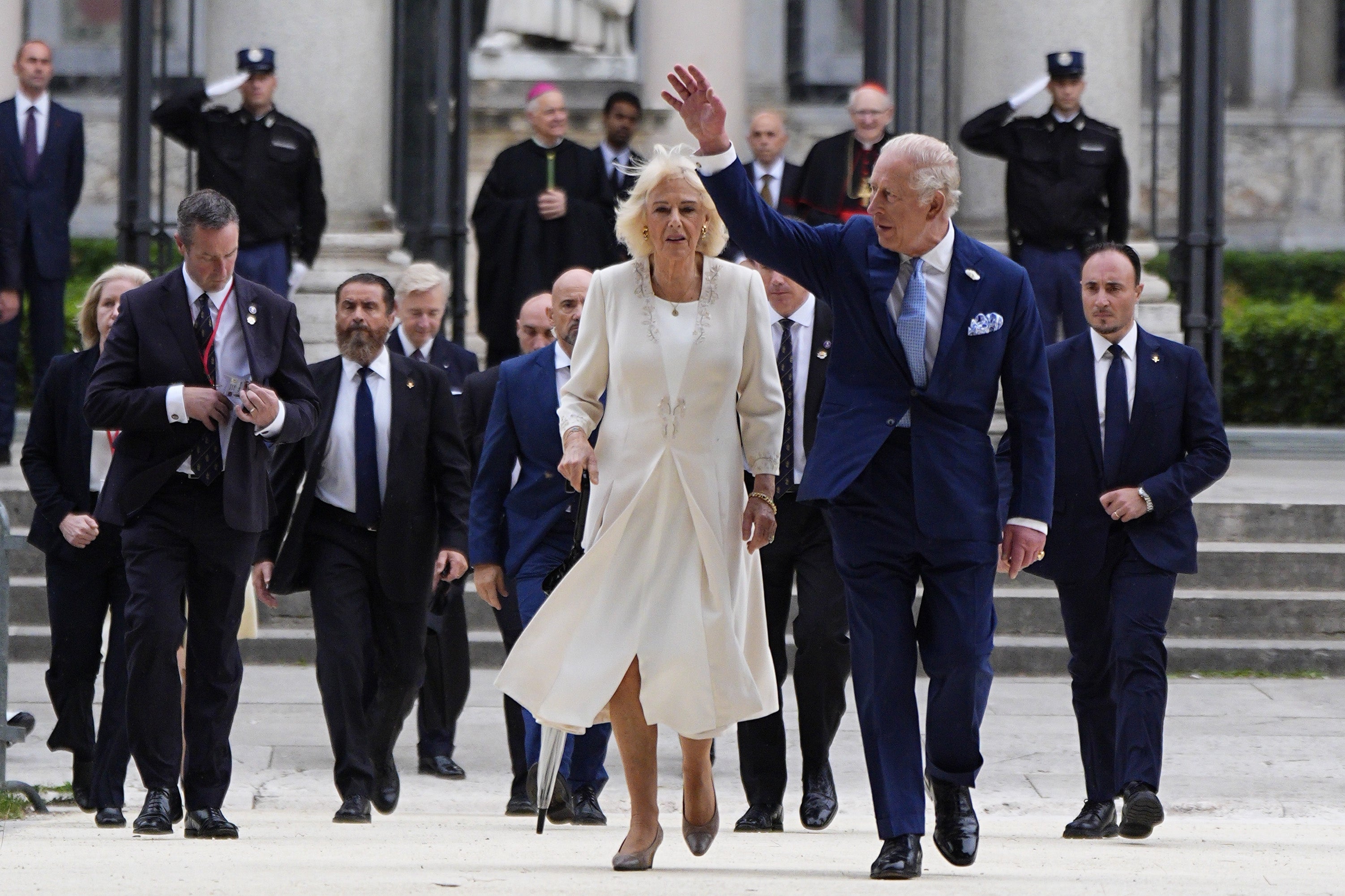 King Charles III and Queen Camilla leave the Papal Basilica and Convent of St Paul Outside the Walls during their state visit to the Vatican in October 2025.