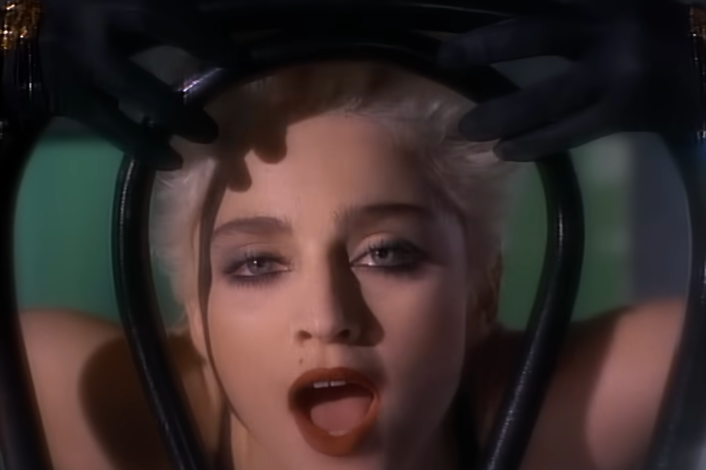 Madonna in her video for ‘Open Your Heart’ (Warner Bros)