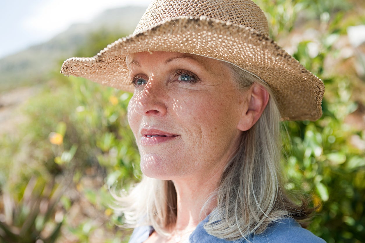 Experts recommend wearing a hat in the sun to protect your hair.