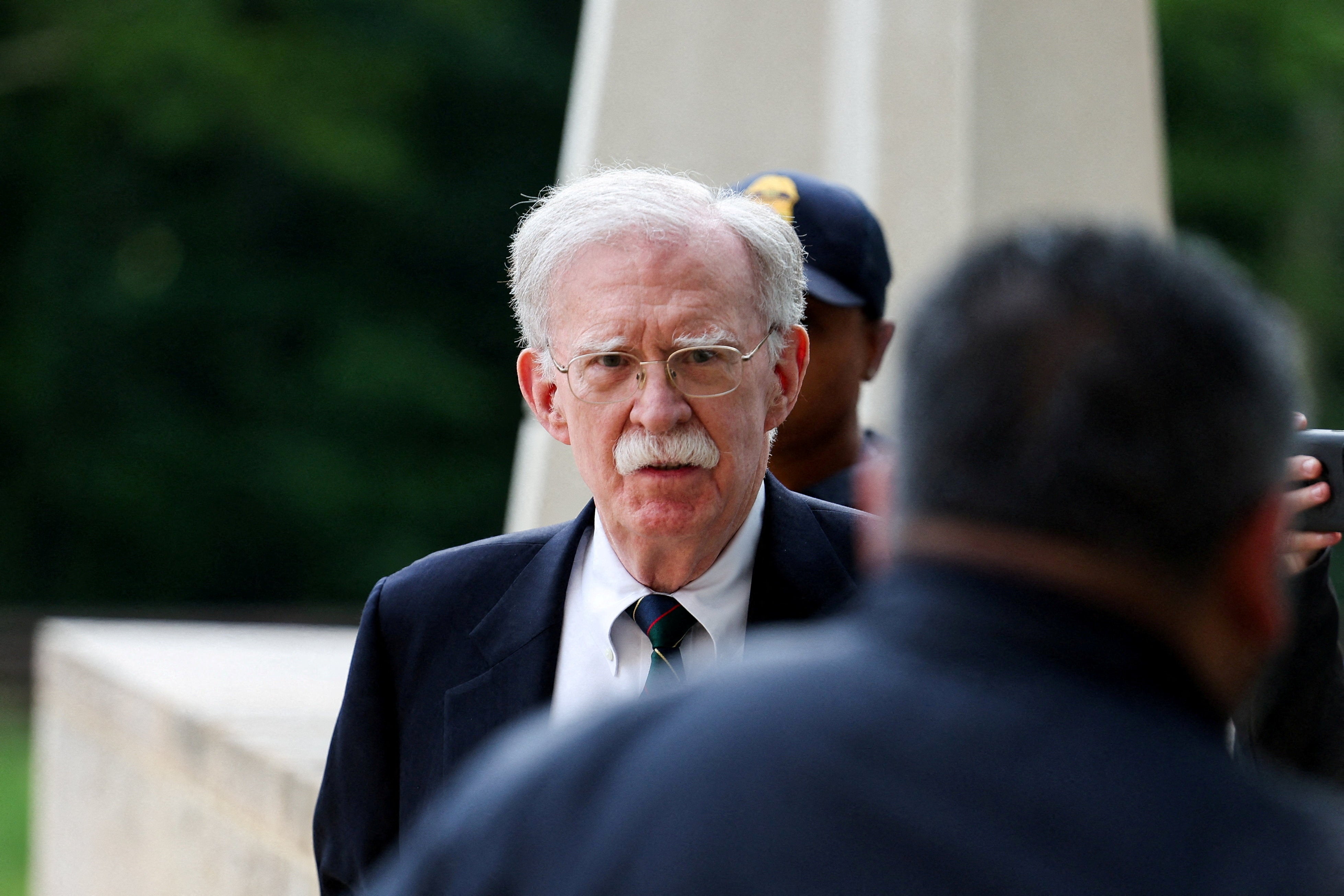 Bolton was originally charged with 18 counts after being accused of sharing sensitive information with two relatives for possible use in a memoir he was writing, including notes on intelligence briefings and meetings with senior government officials and foreign leaders