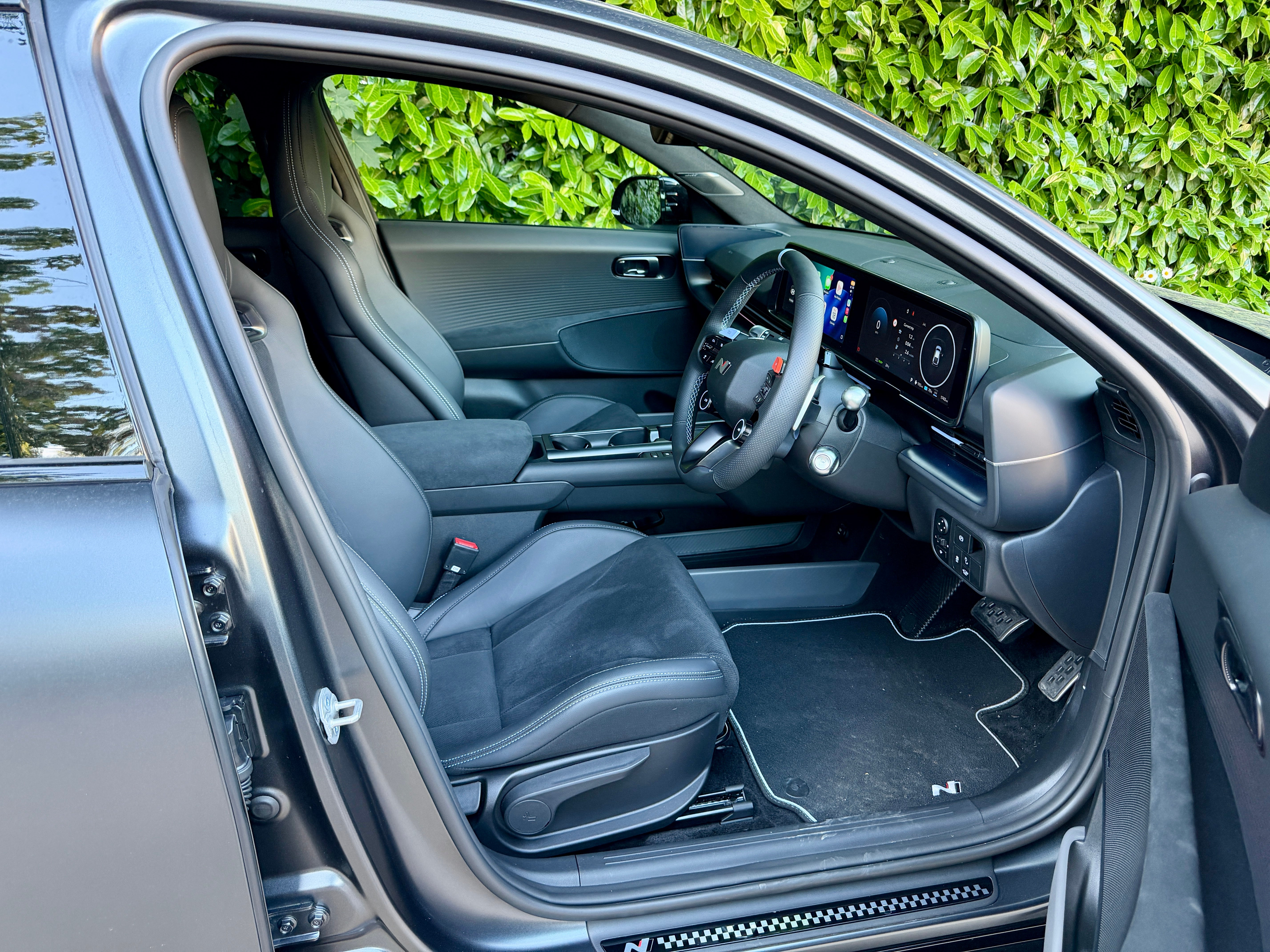 Grippy sports front seats hold you well in corners, and are comfy on longer drives, too