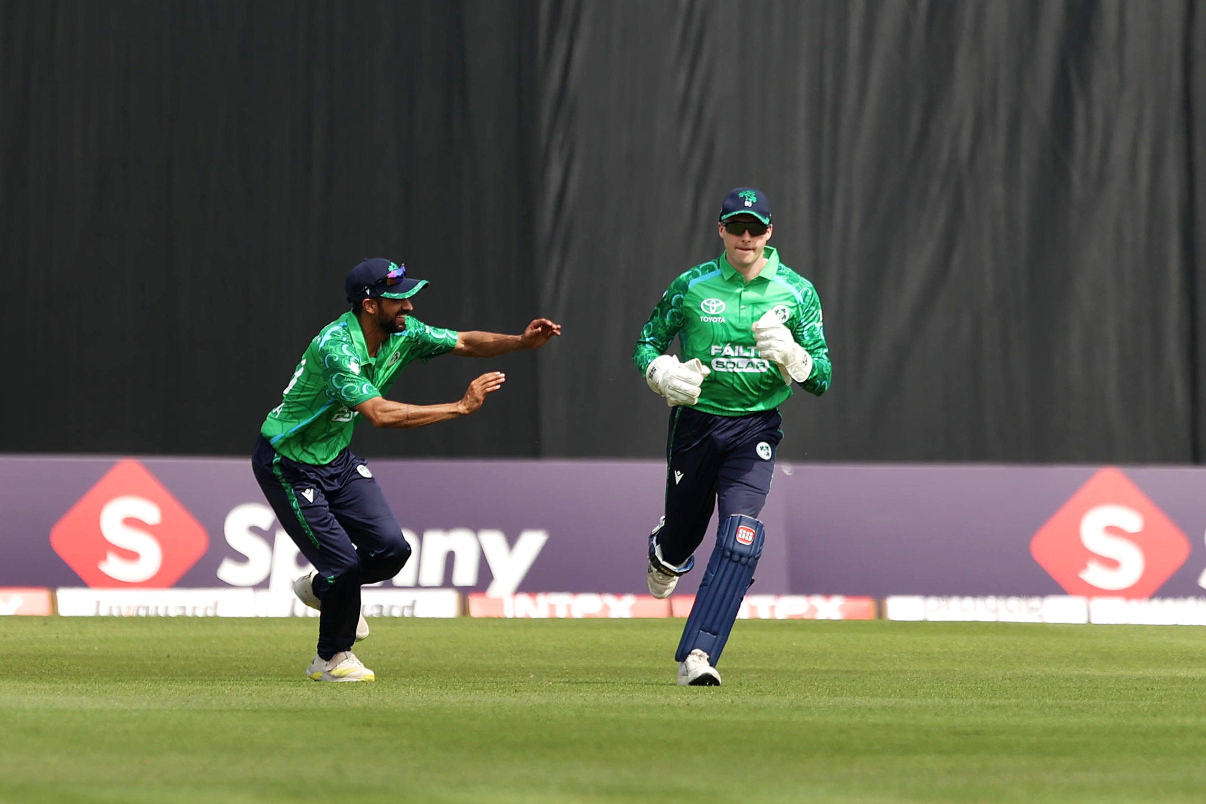 Ireland’s Lorcan Tucker, right, celebrates after catching out India’s Ishan Kishan off the bowling of Matt Hollard (Liam McBurney/PA). (PA Wire)