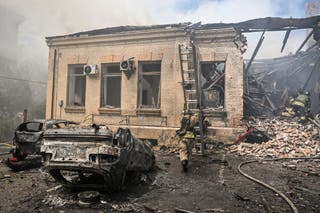 Firefighters work at the site of a Russian military strike, amid Russia's attack on Ukraine, in Zaporizhzhia, Ukraine June 26