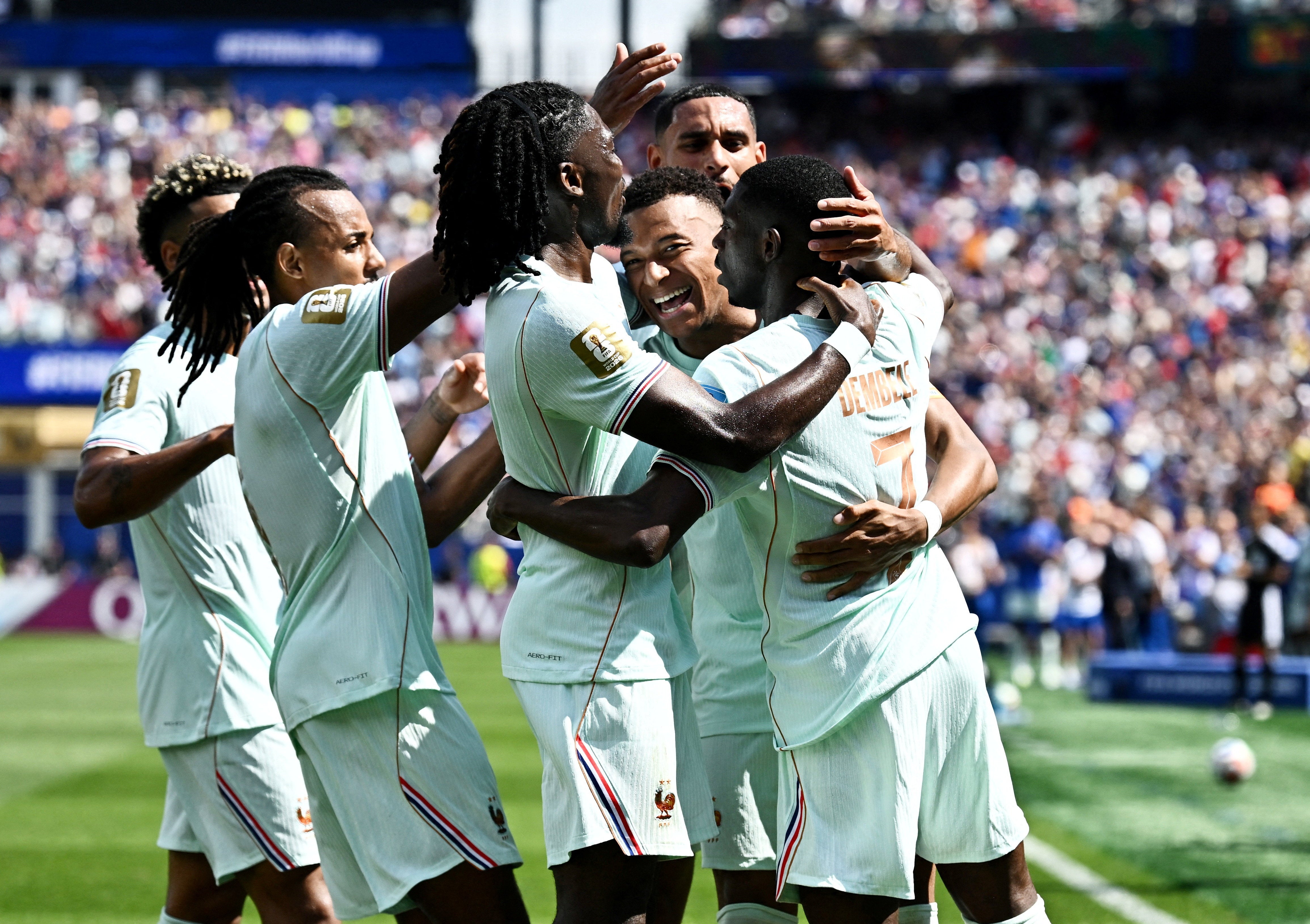 France hit four against Norway to win Group I