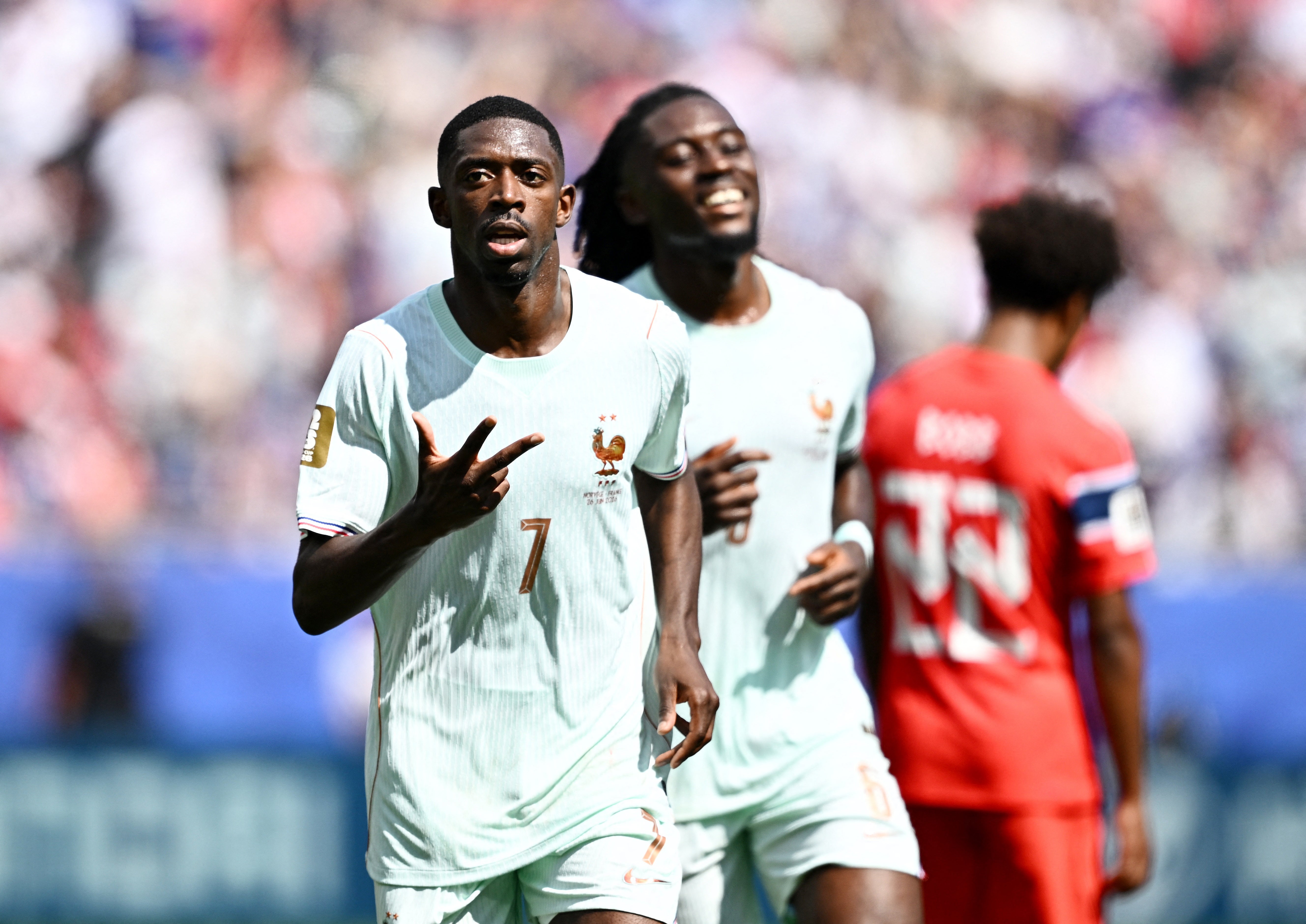 France's Ousmane Dembele celebrates scoring their third goal