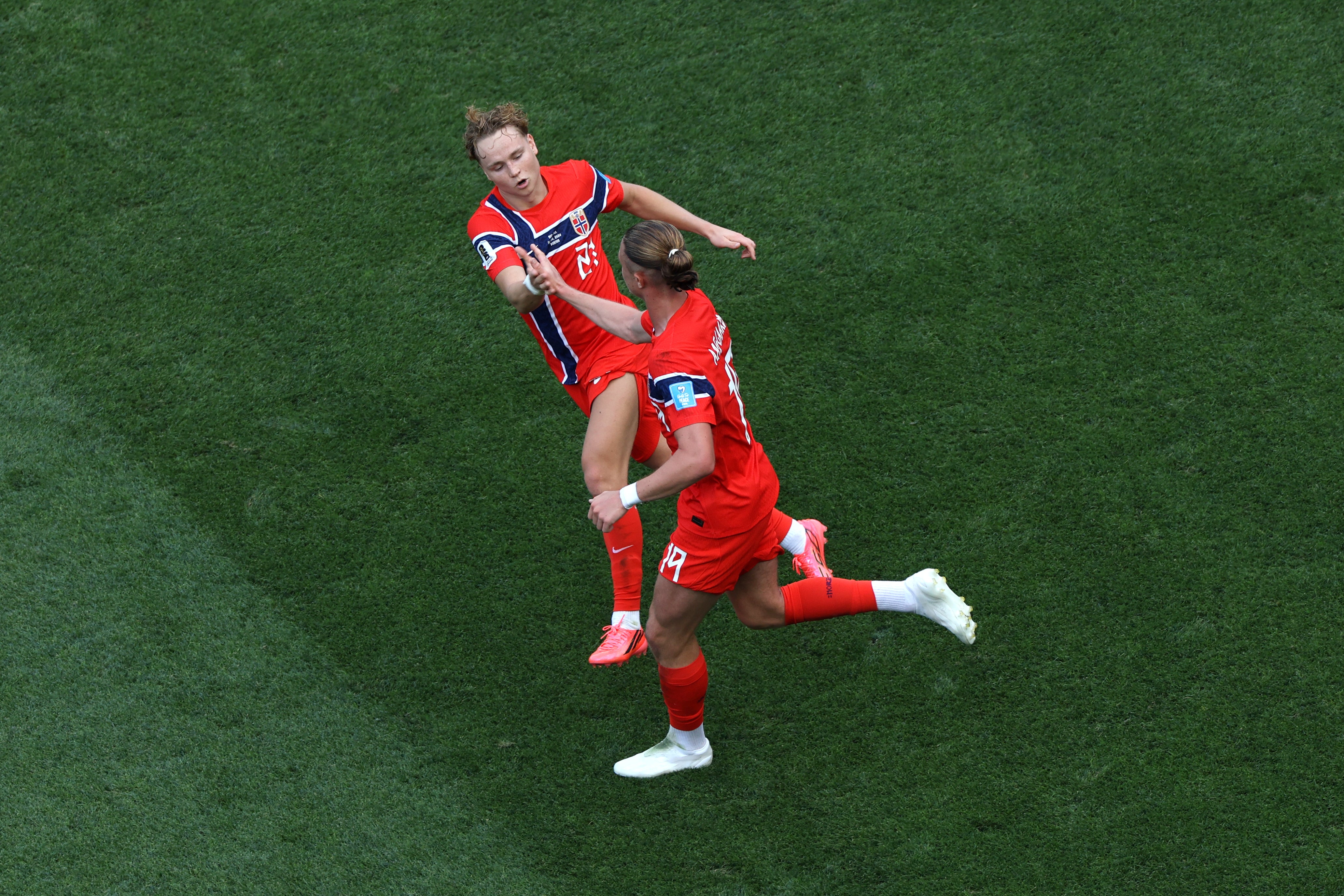 Thelo Aasgaard of Norway celebrates with Andreas Schjelderup