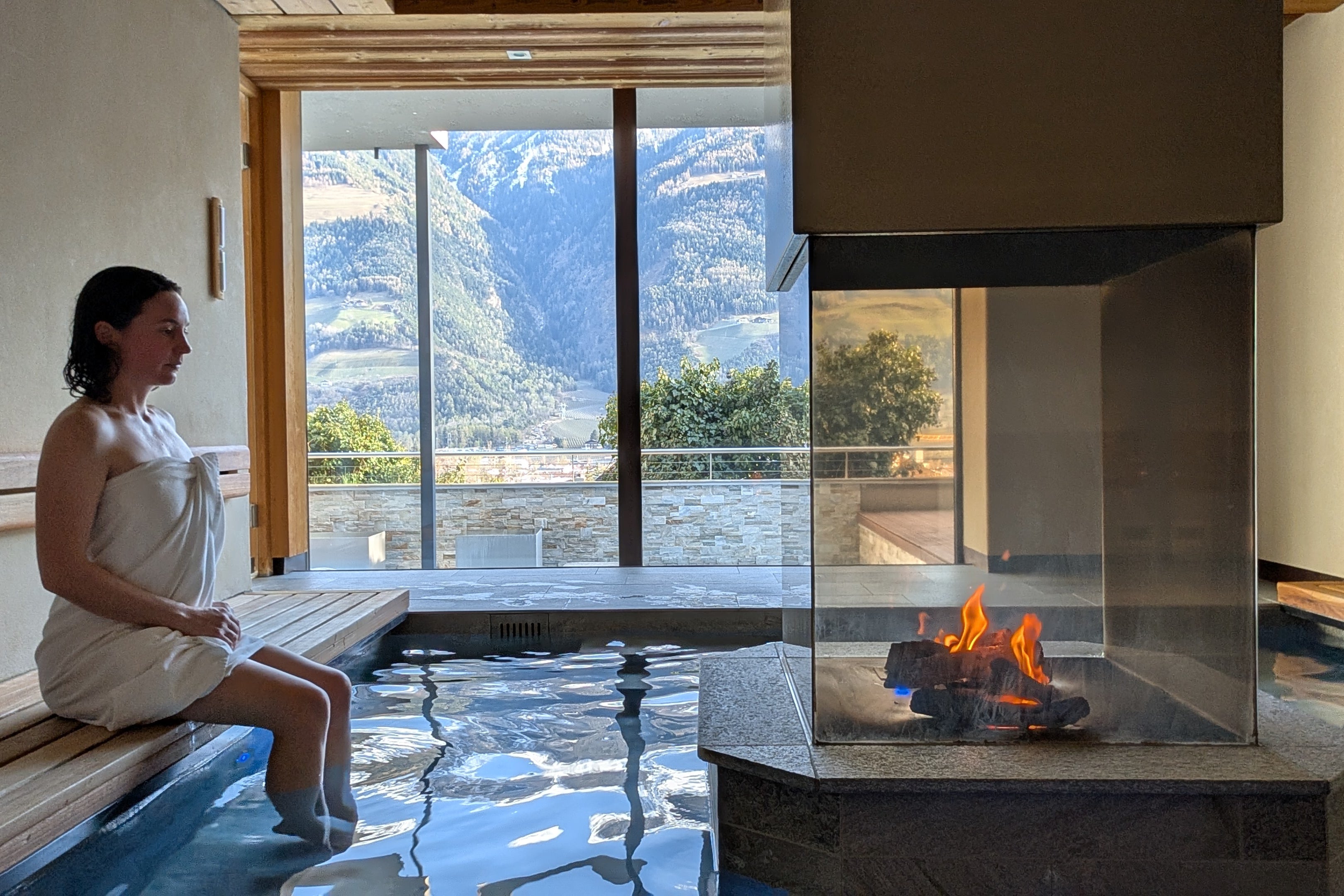 Julia soaking her feet in the Five Elements Sauna at the Preidlhof (Julia Clarke)