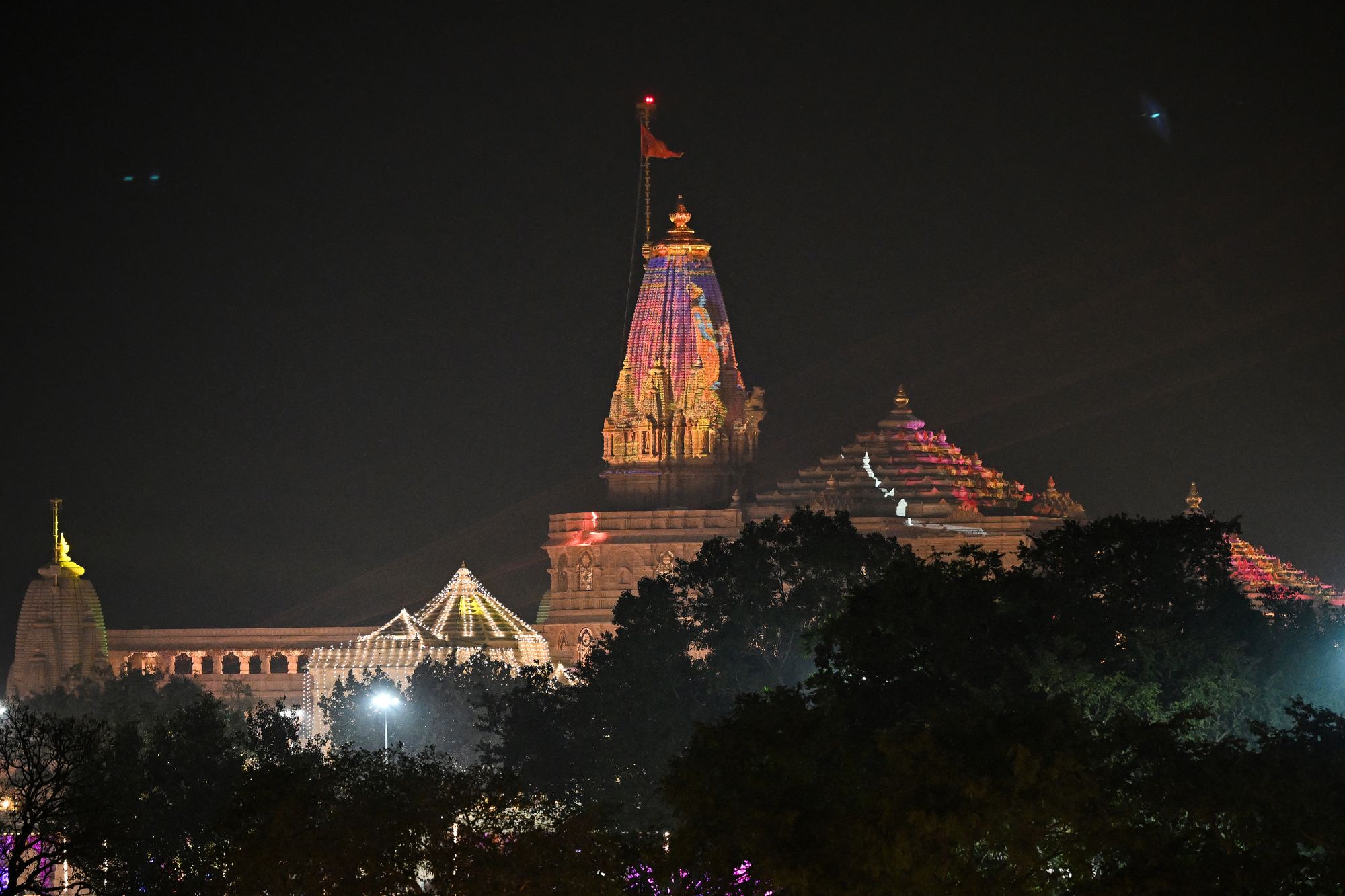 A Hindu flag flutters in the wind atop the Ram temple in Ayodhya (AFP/Getty)