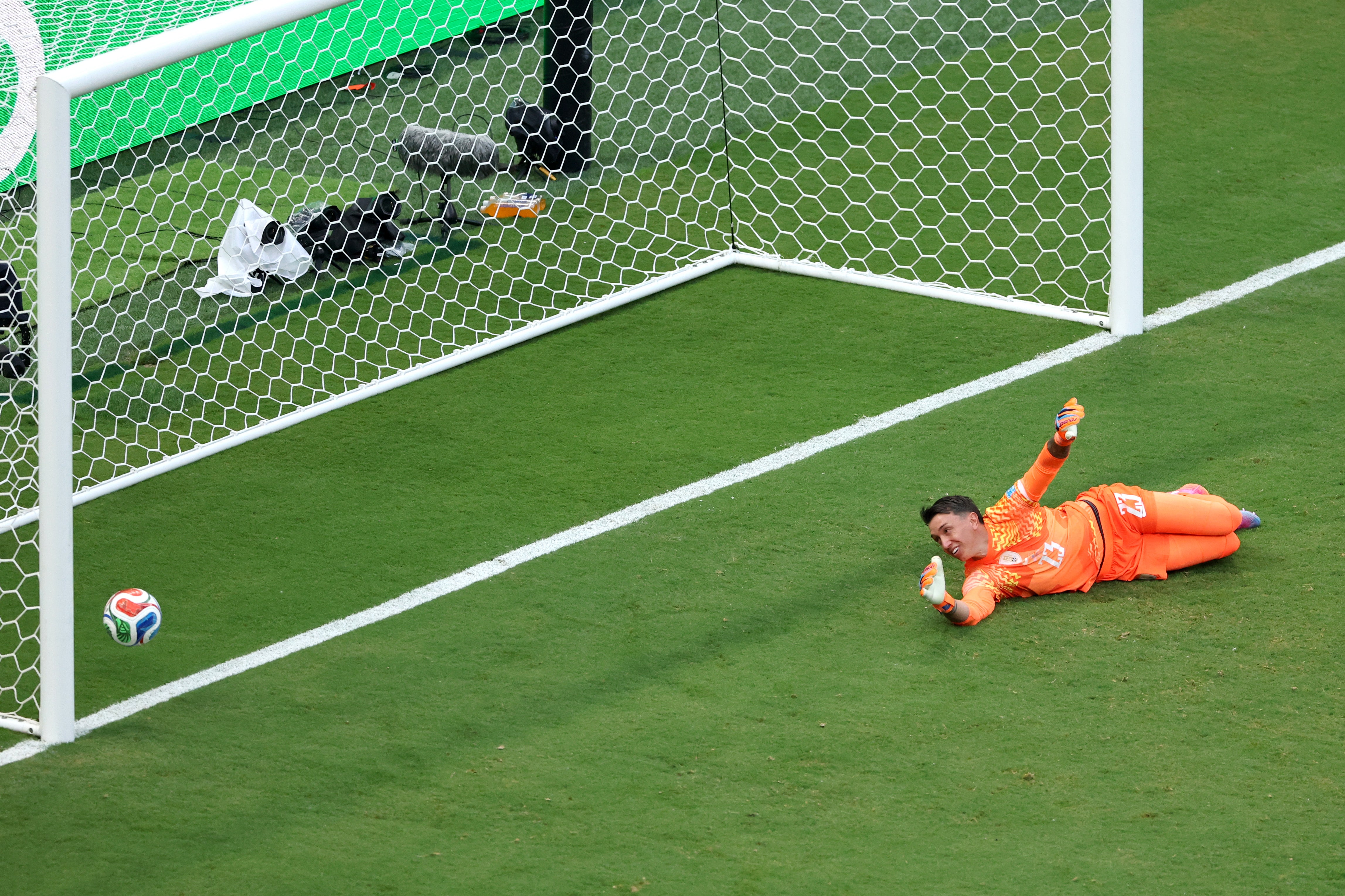 Fernando Muslera bundles the ball into his own net