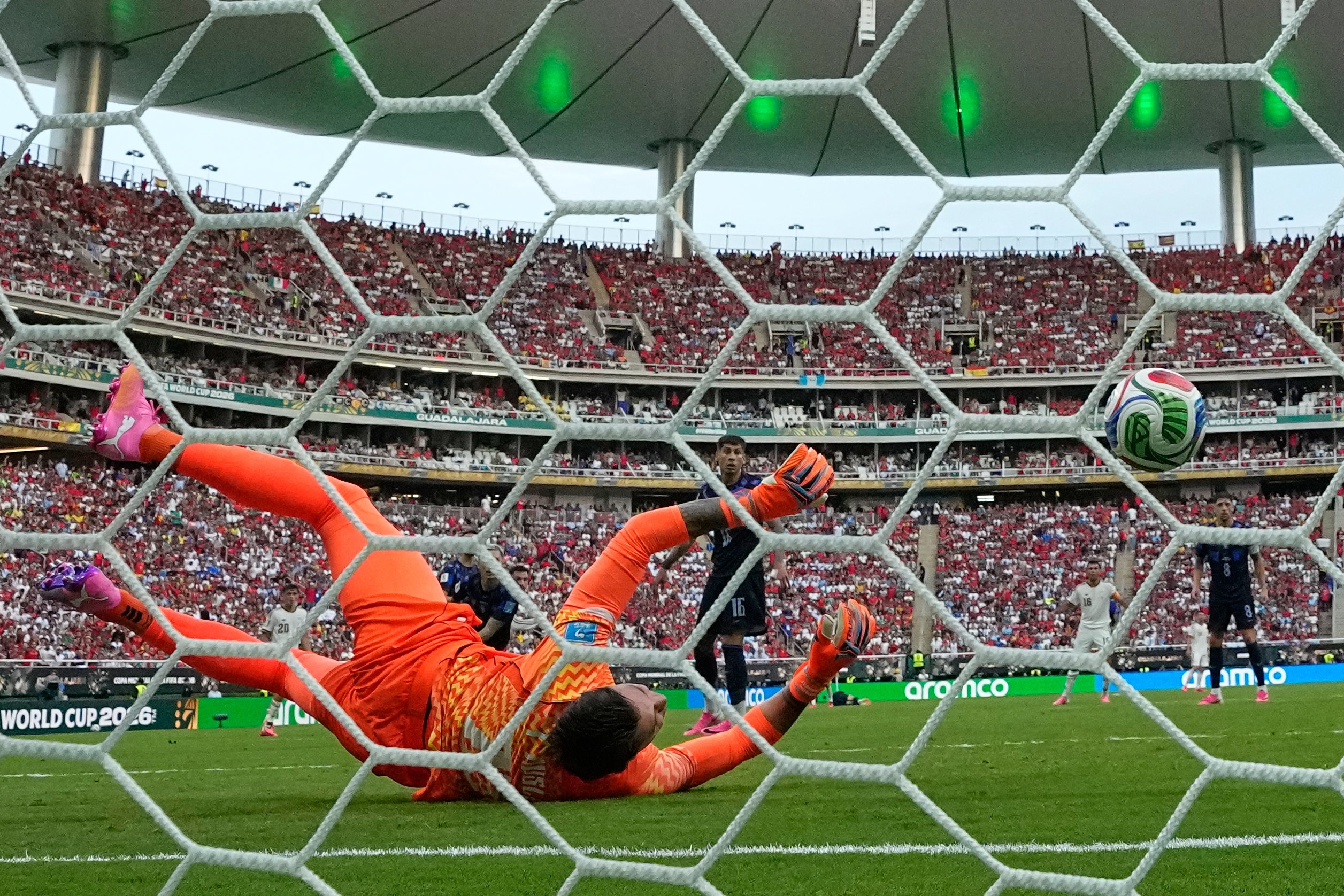 Fernando Muslera bundles the ball into his own net