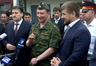 File: Russian Defence Minister Sergei Ivanov (C) speaks to the media as Chechen President Alu Alkhanov (L) and Prime Minister Ramzan Kadyrov (2nd R) listen in Khankala near Grozny July 11, 2006.