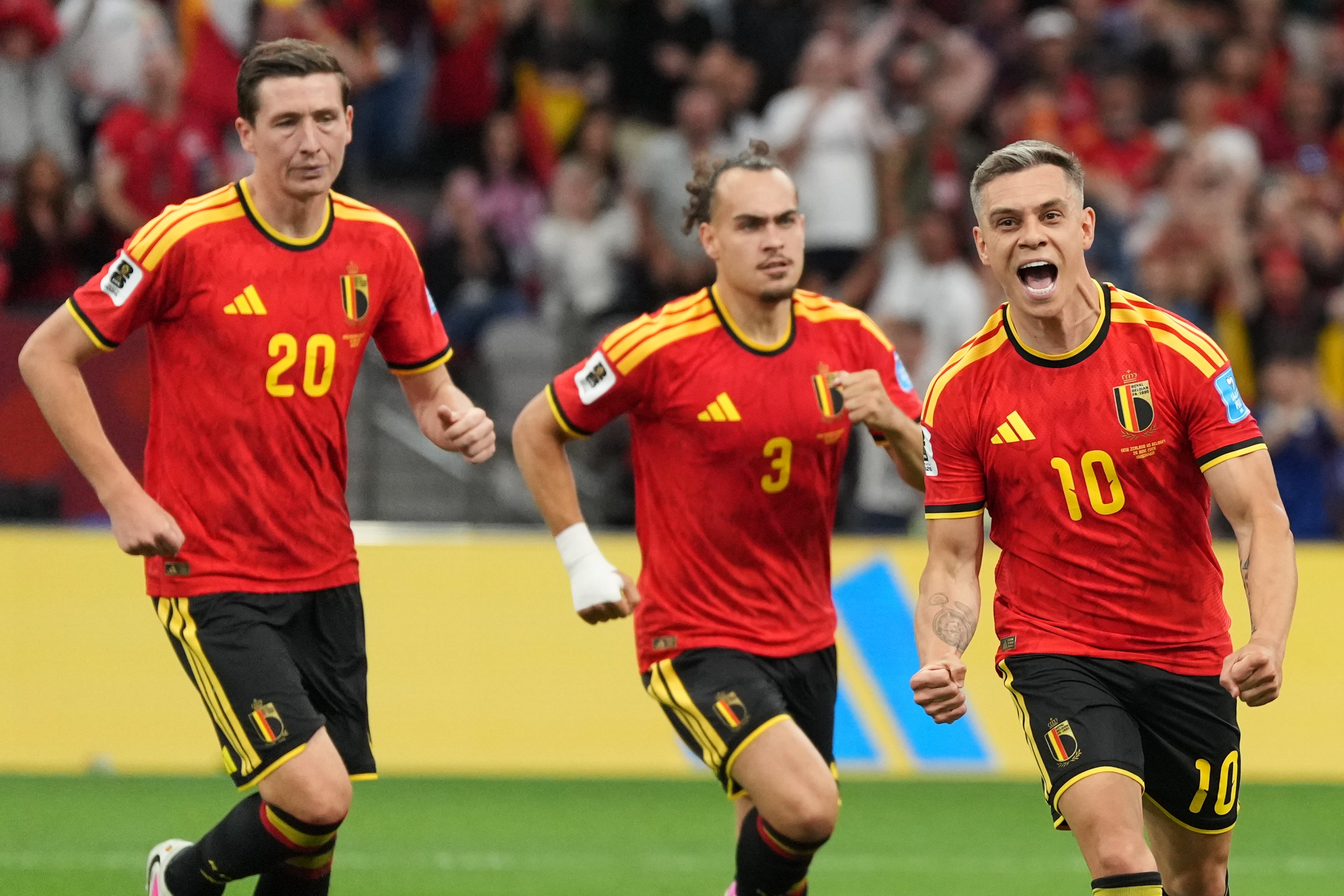Leandro Trossard celebrates scoring for Belgium (AP)