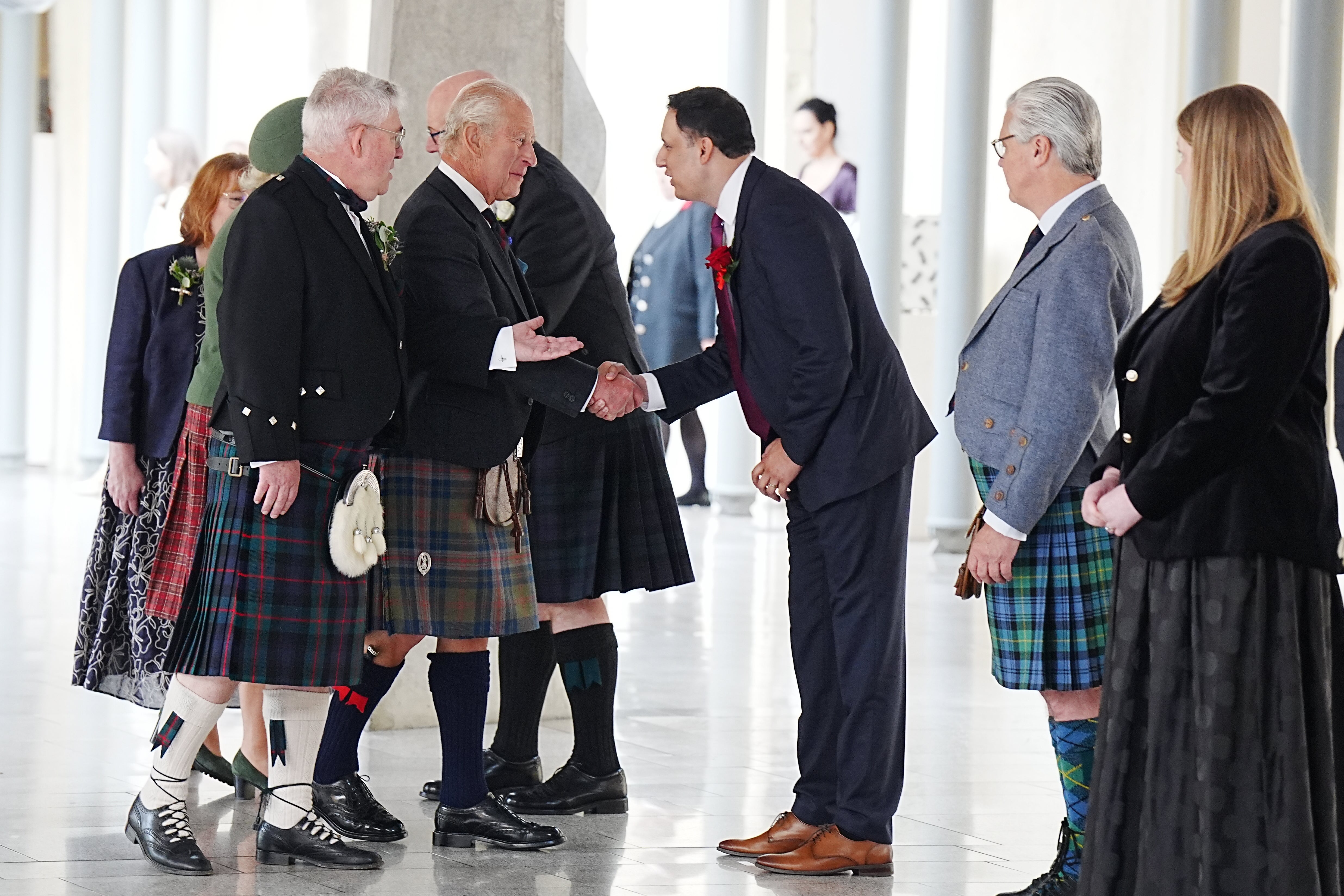 The King is greeted by Scottish Labour leader Anas Sarwar (third right) (Jane Barlow/PA) (PA Wire)