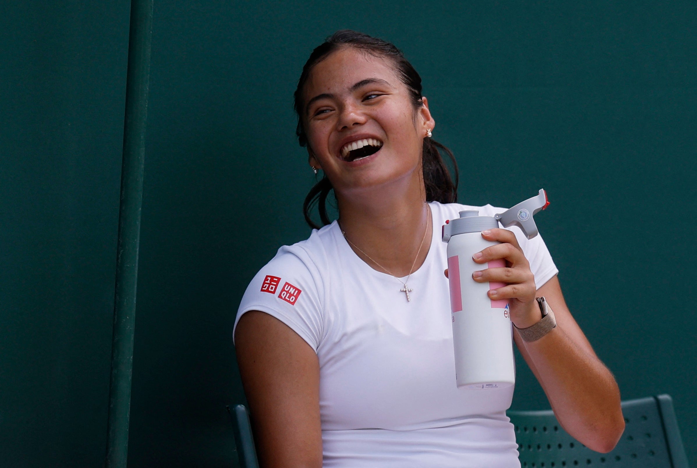 Raducanu was seen laughing with her team but she wore strapping around her right ankle