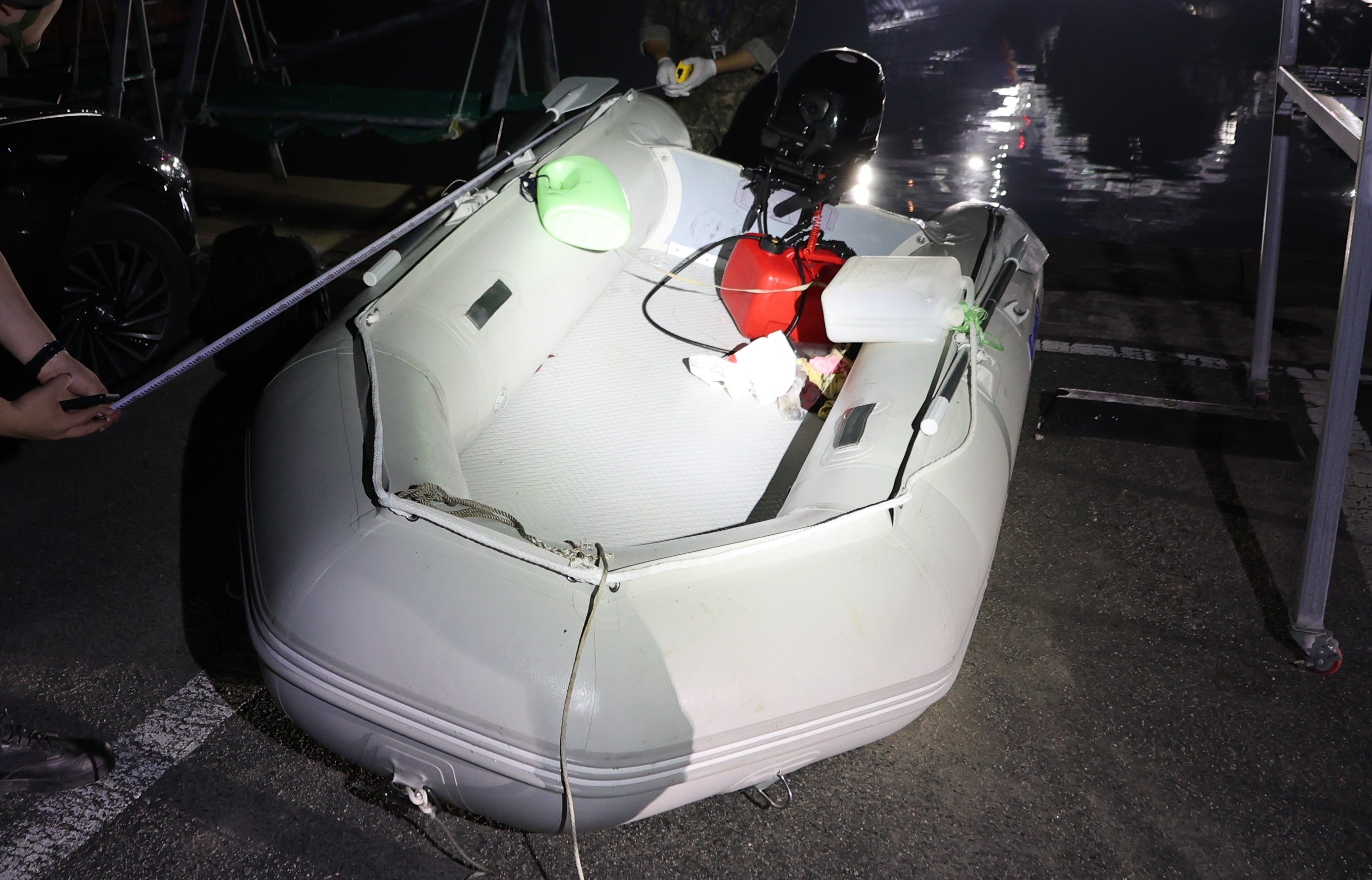 This photo provided by The Taean Maritime Police, shows the rubber boat that a Dong Guangpinghad boarded when he was detained in the waters off South Korea's west coast, at a port in Taean, South Korea