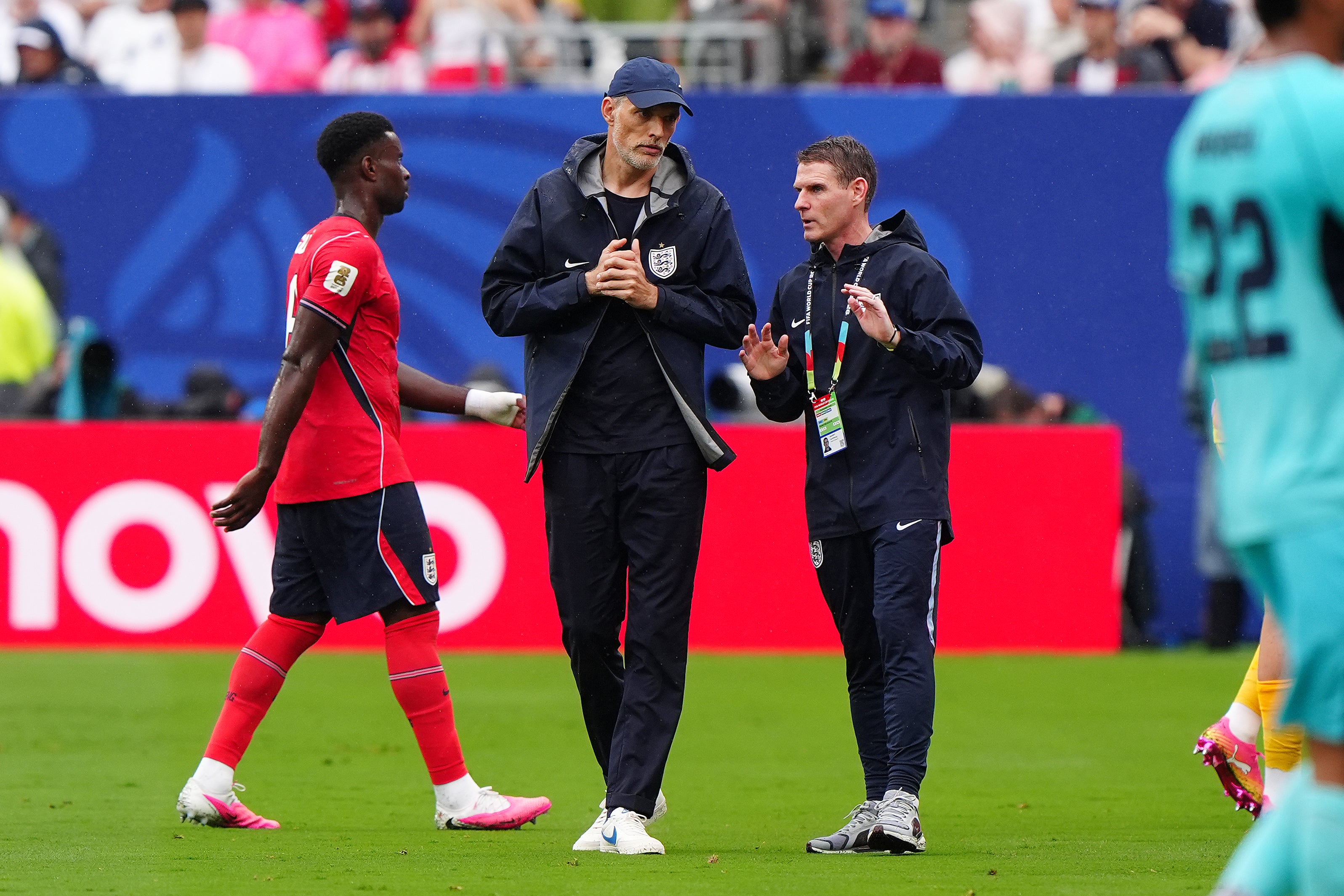 England head coach Thomas Tuchel and assistant head coach Anthony Barry during the first half hydration break of the FIFA World Cup Group L match