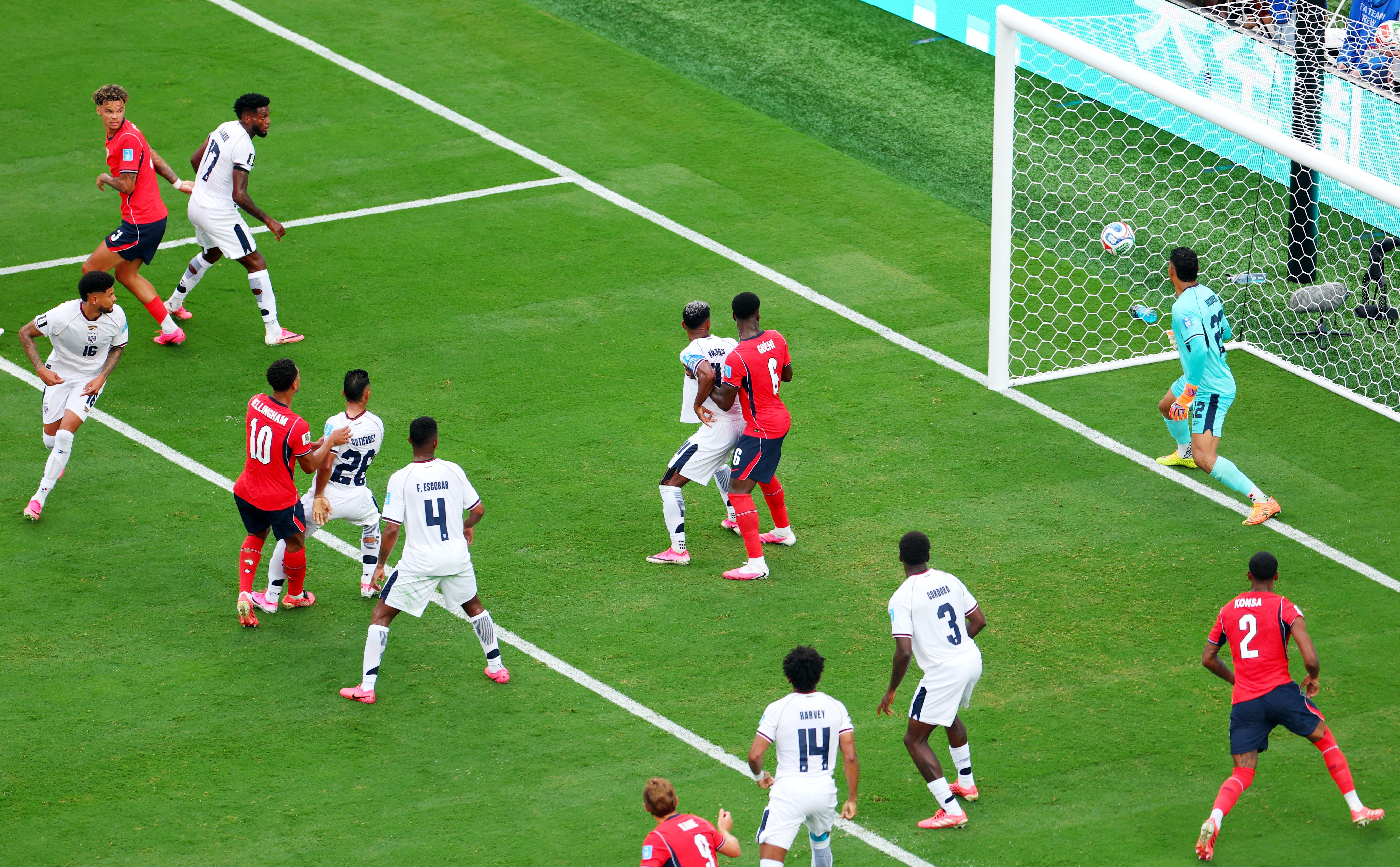 Jude Bellingham, red No 10, watches as his toe poke finds the net