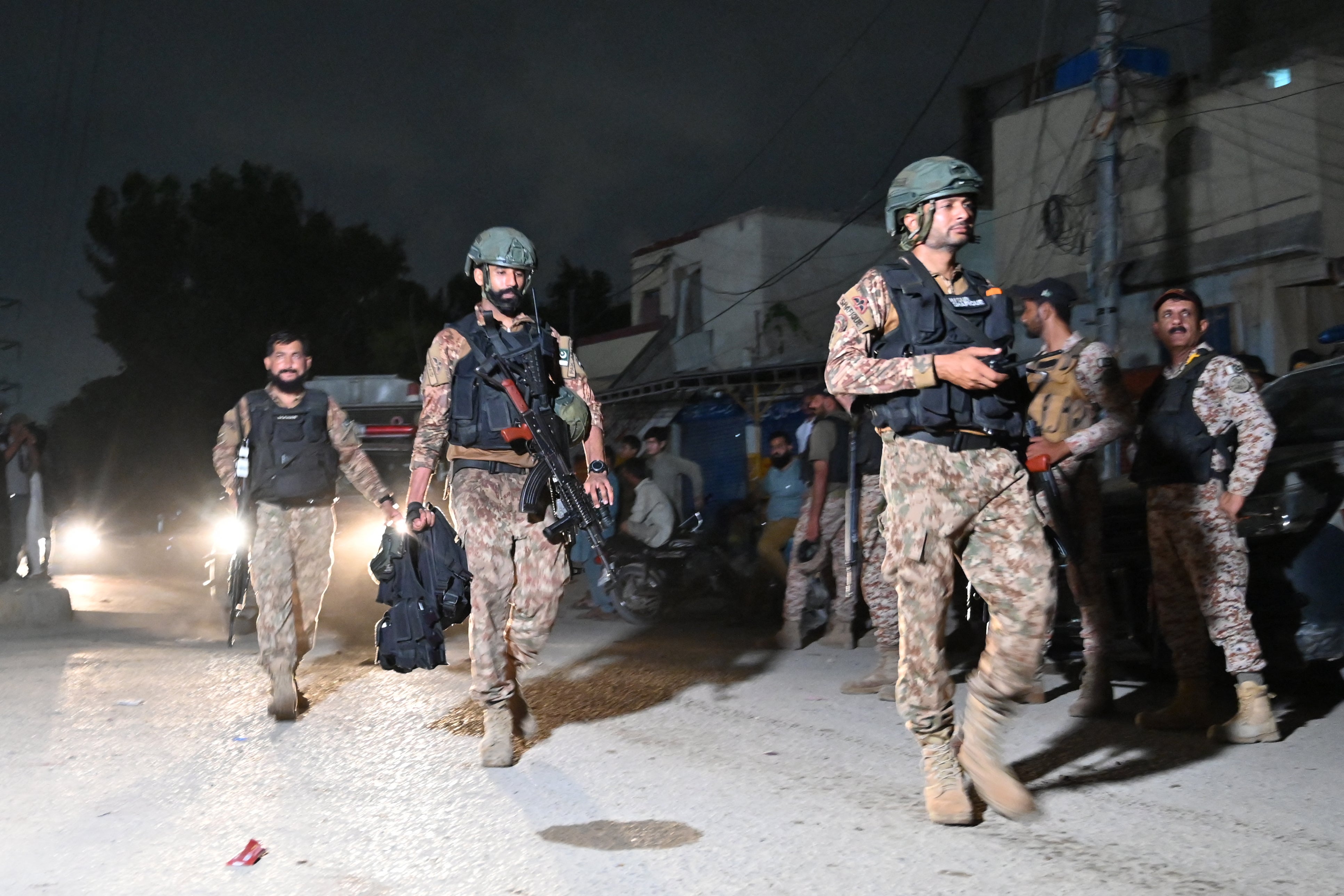 Soldiers conduct a clearance operation following a militant attack in Karachi on 28 June 2026