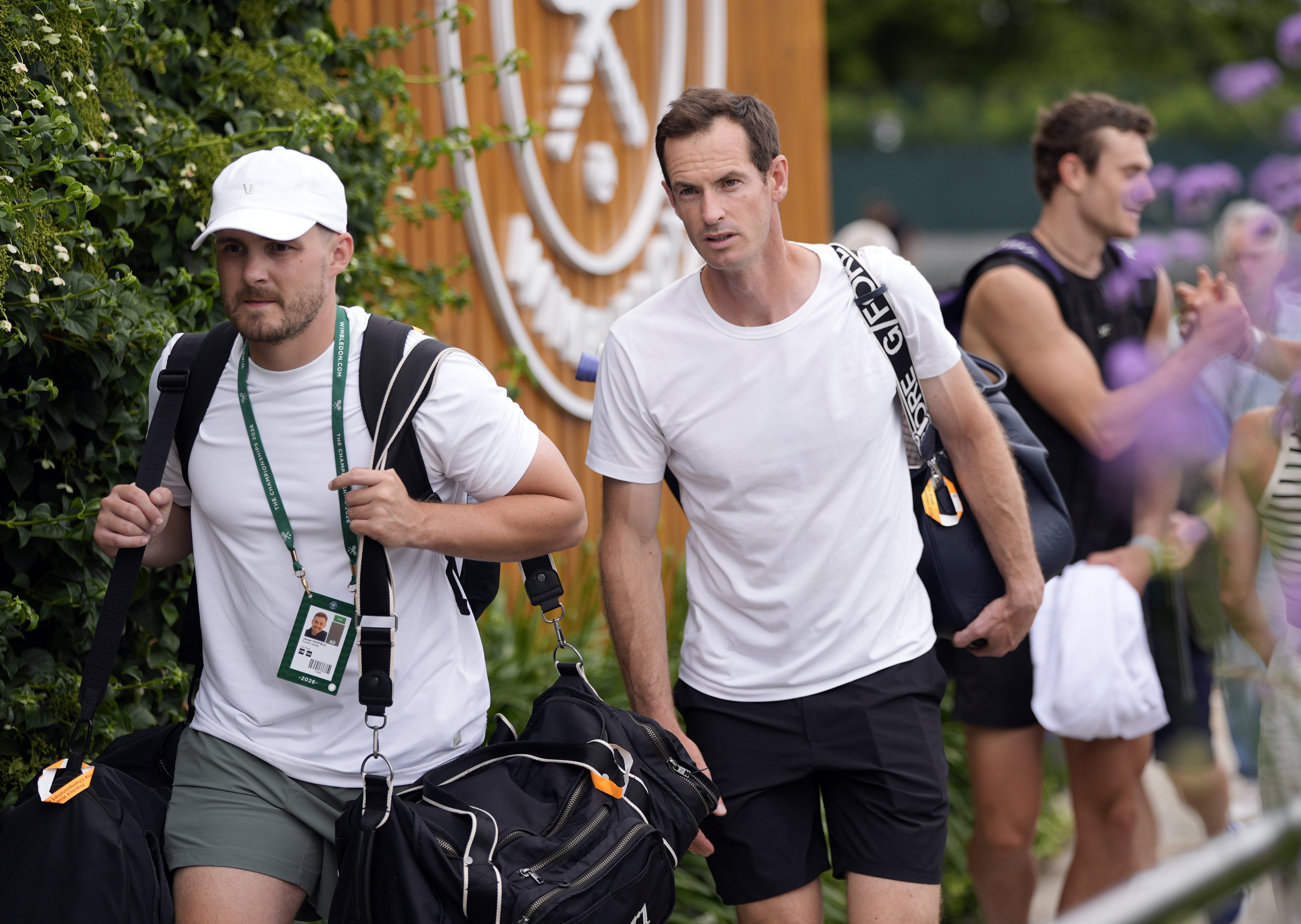 Andy Murray, centre, is coaching Jack Draper at Wimbledon (Andrew Matthews/PA)