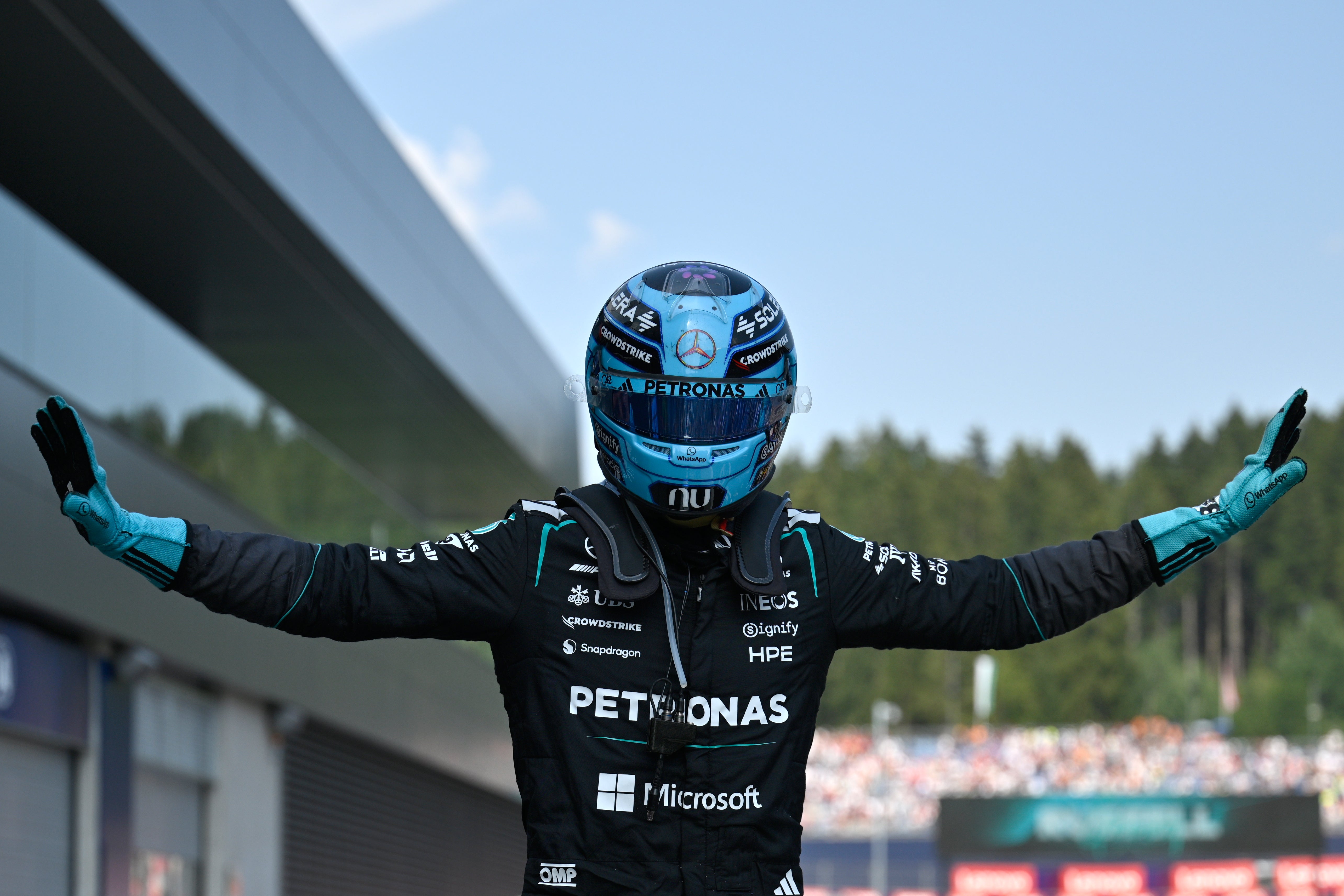 George Russell celebrates (Denes Erdos/AP)