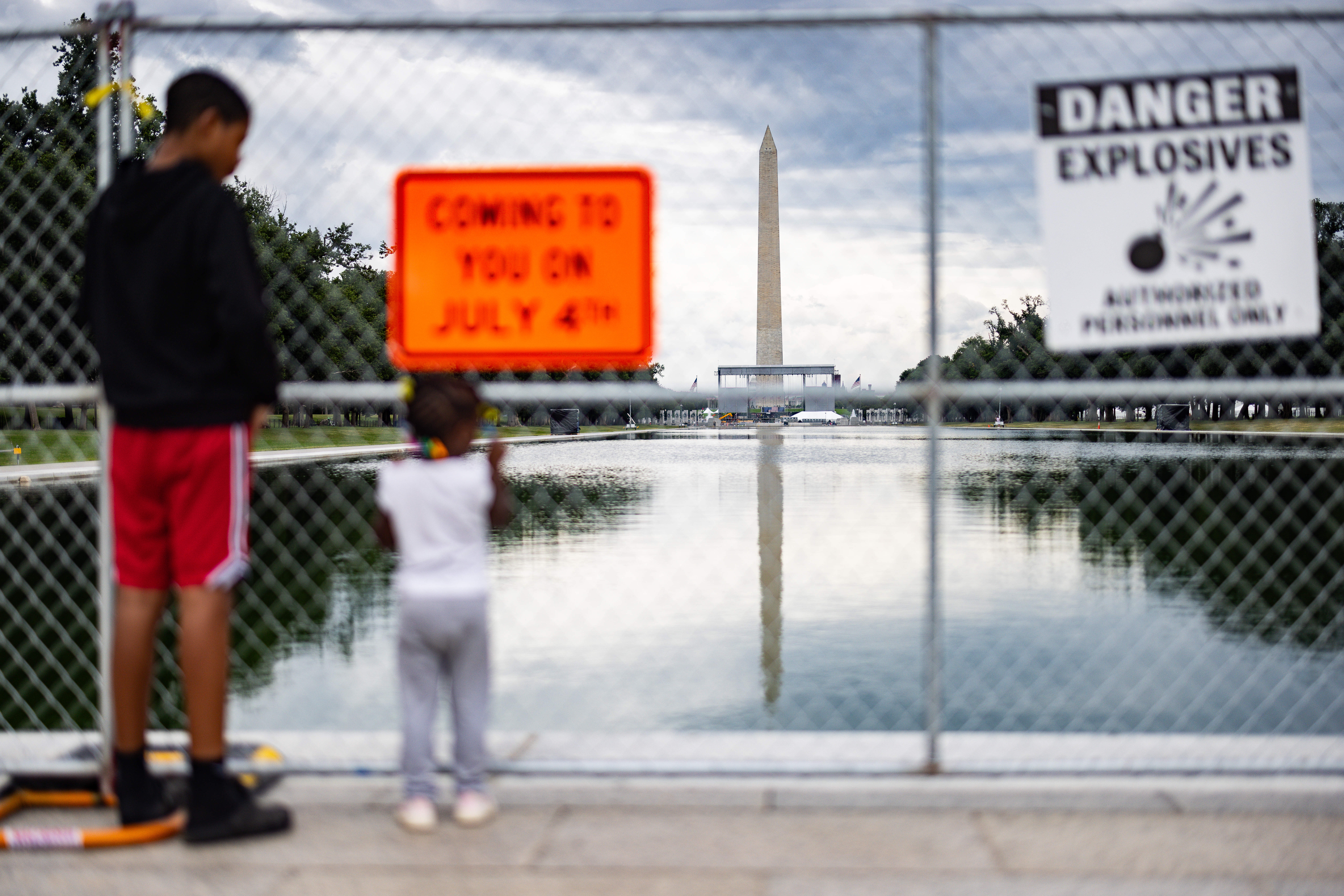 Trump claimed that the Reflecting Pool is back in working order, but fencing still blocks the public from the grounds
