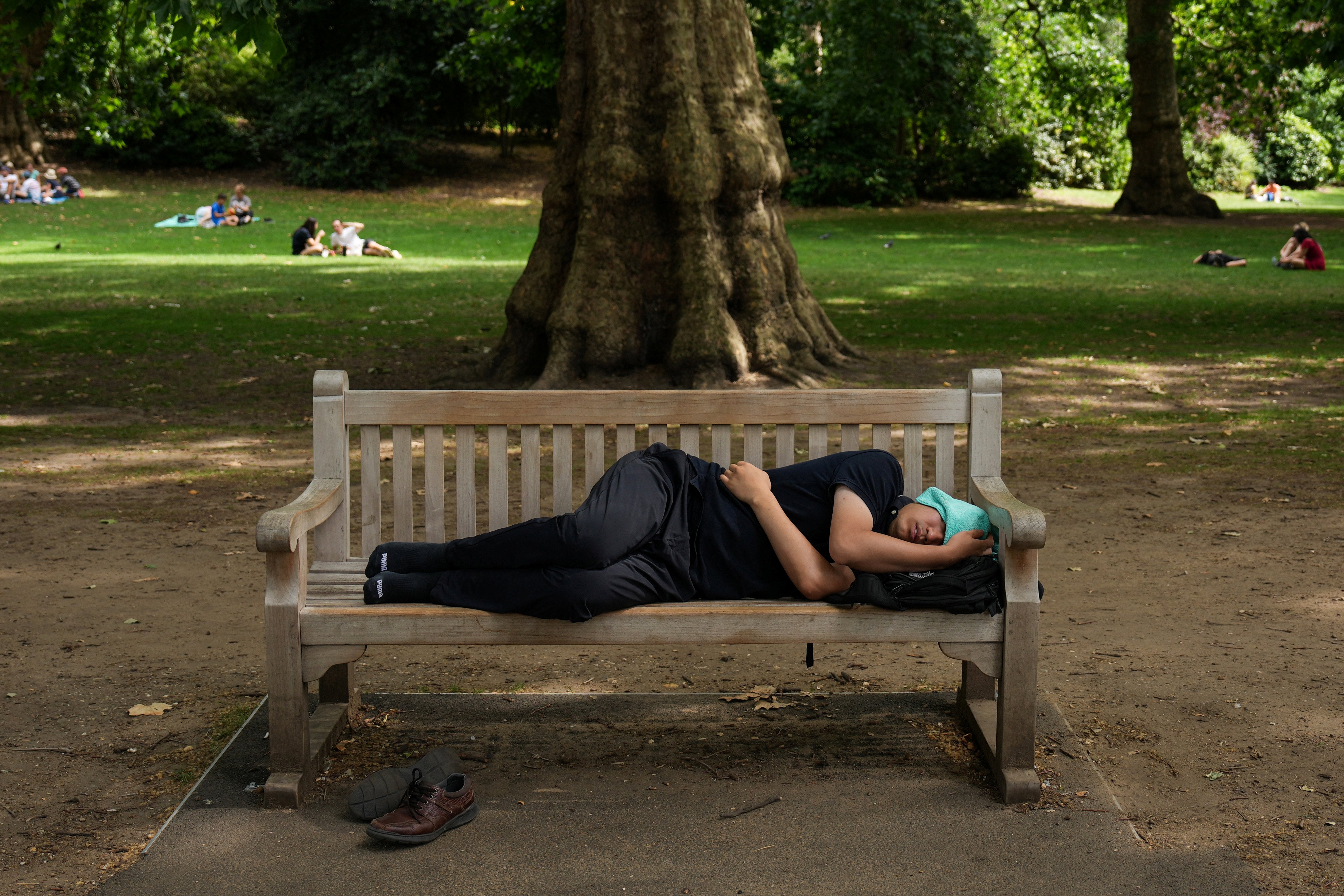 The NHS advises people to stay out of the sun where possible, especially between 11am and 3pm (AFP/Getty)