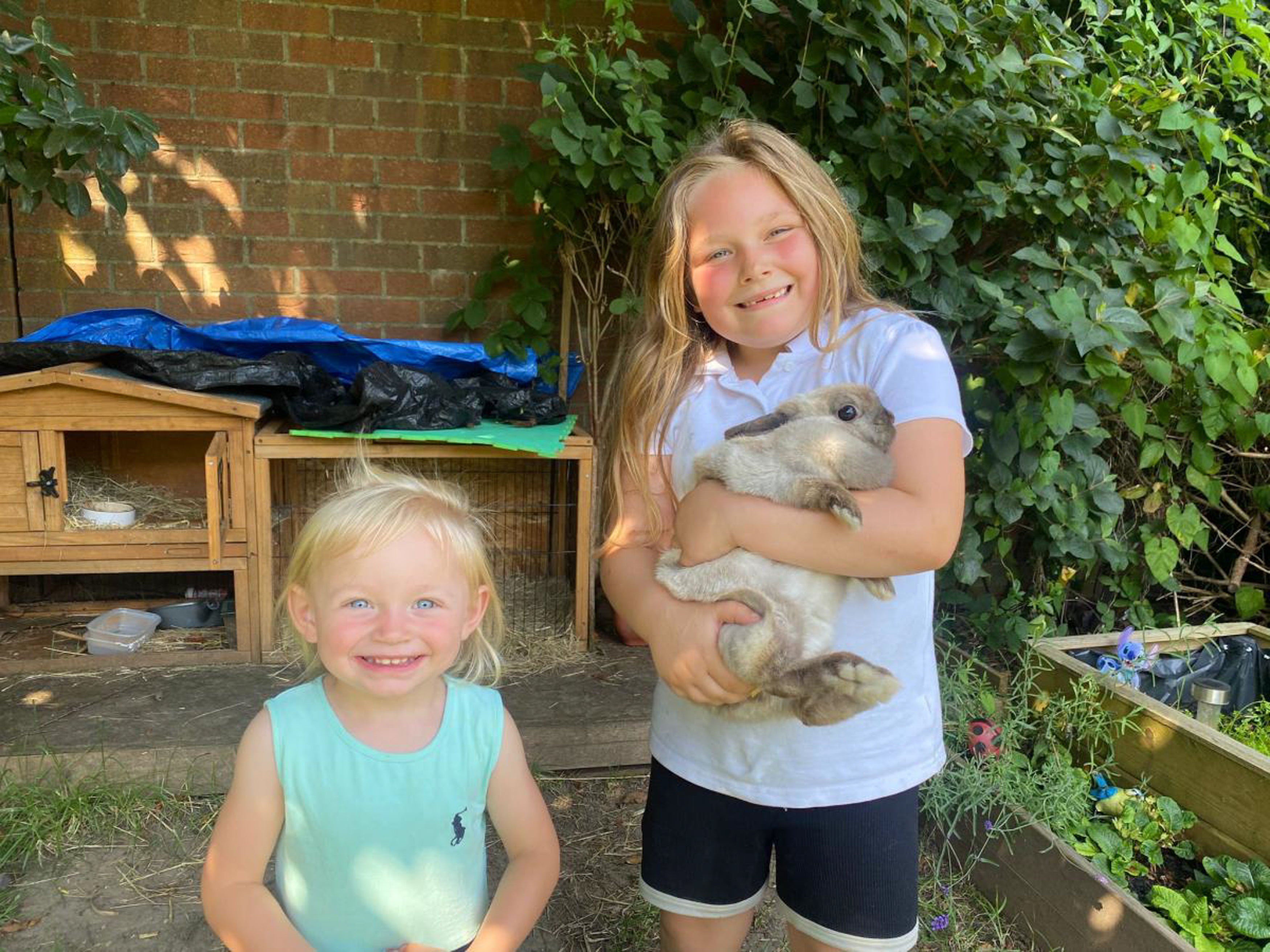 Arizona, two, and Everest, six, with Nibbles