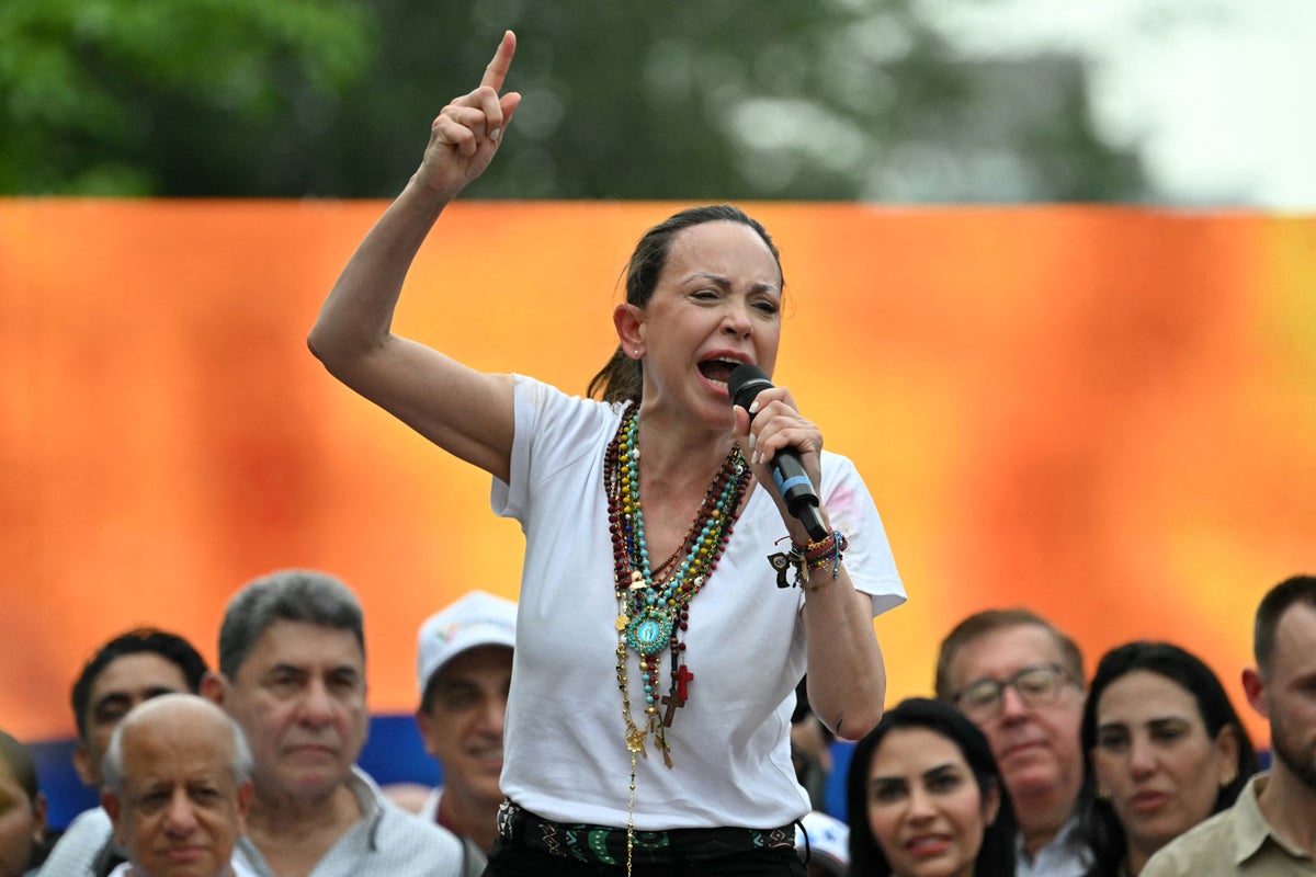 Venezuela’s opposition leader in exile says she will do ‘whatever it takes’ to return to help earthquake victims