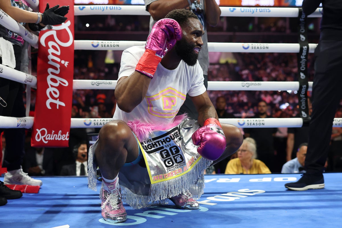 Ennis added to his previous status as a welterweight world champion