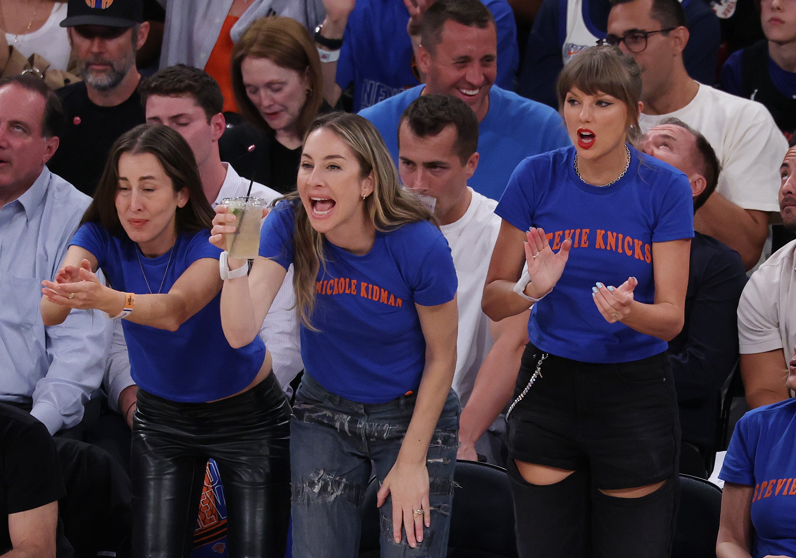 Swift (right) and the Haim sisters watching the Knicks in June