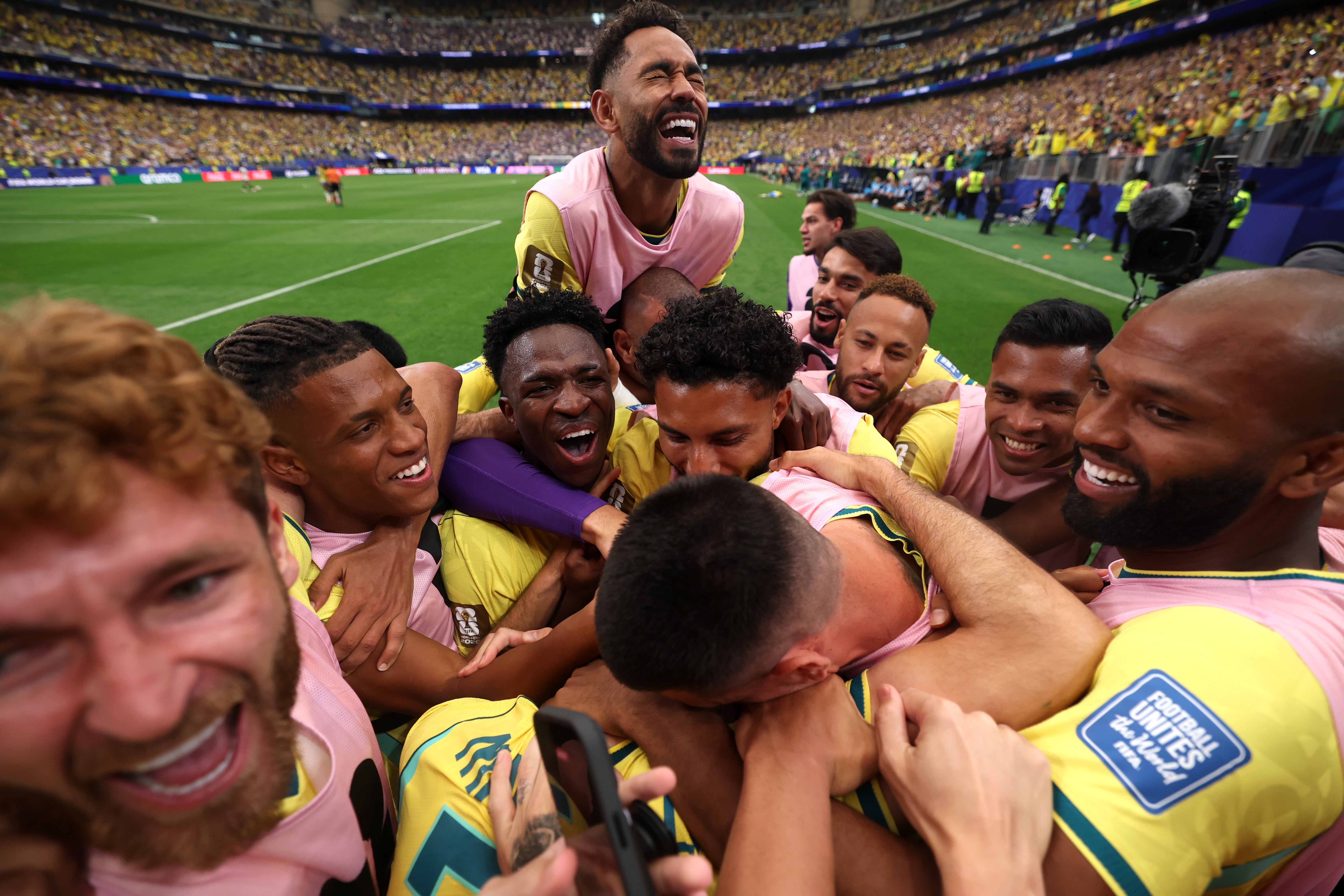 Gabriel Martinelli of Brazil celebrates with teammates