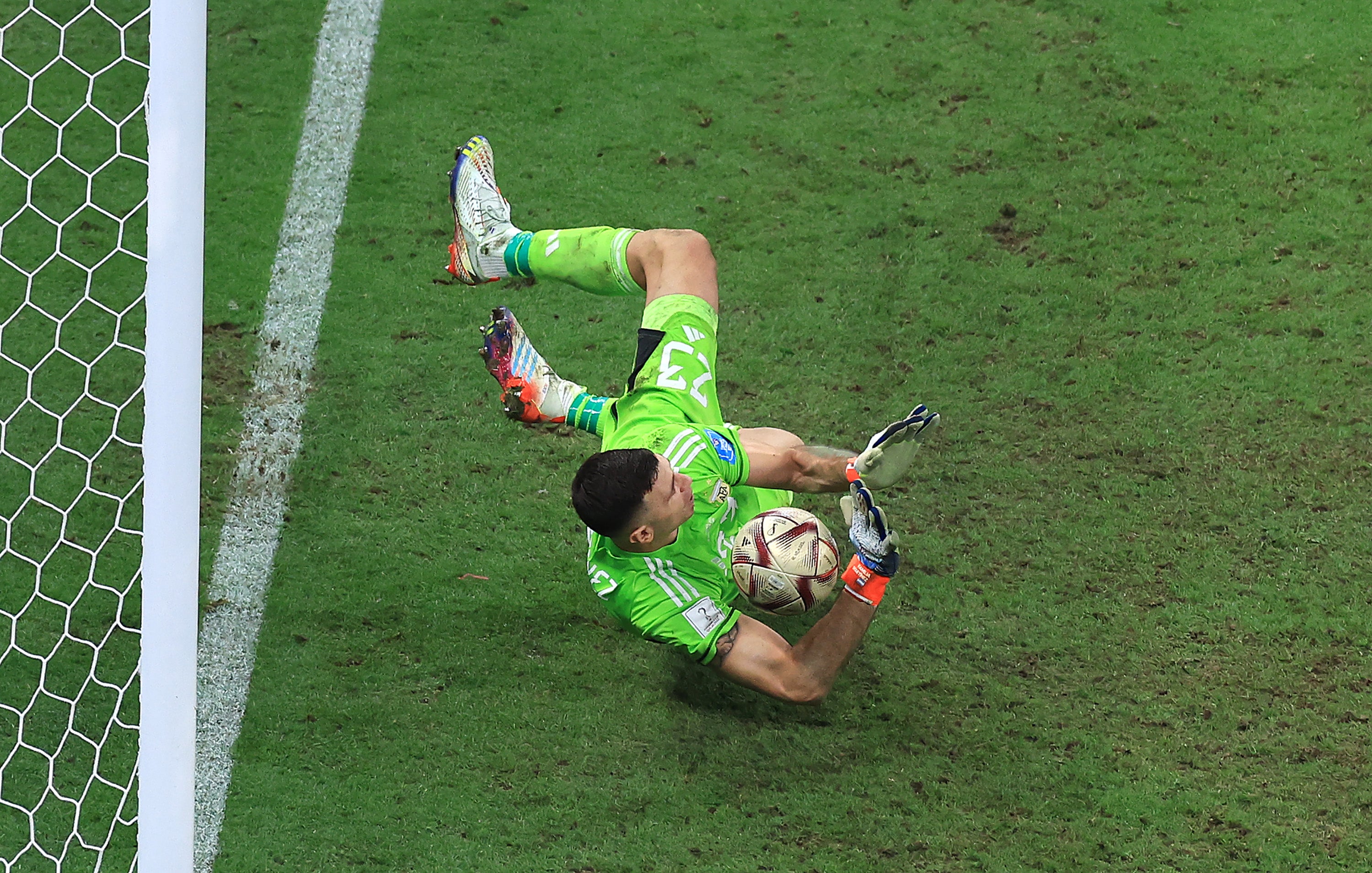 Emiliano Martinez saved Kingsley Coman's penalty in the 2022 World Cup final shootout