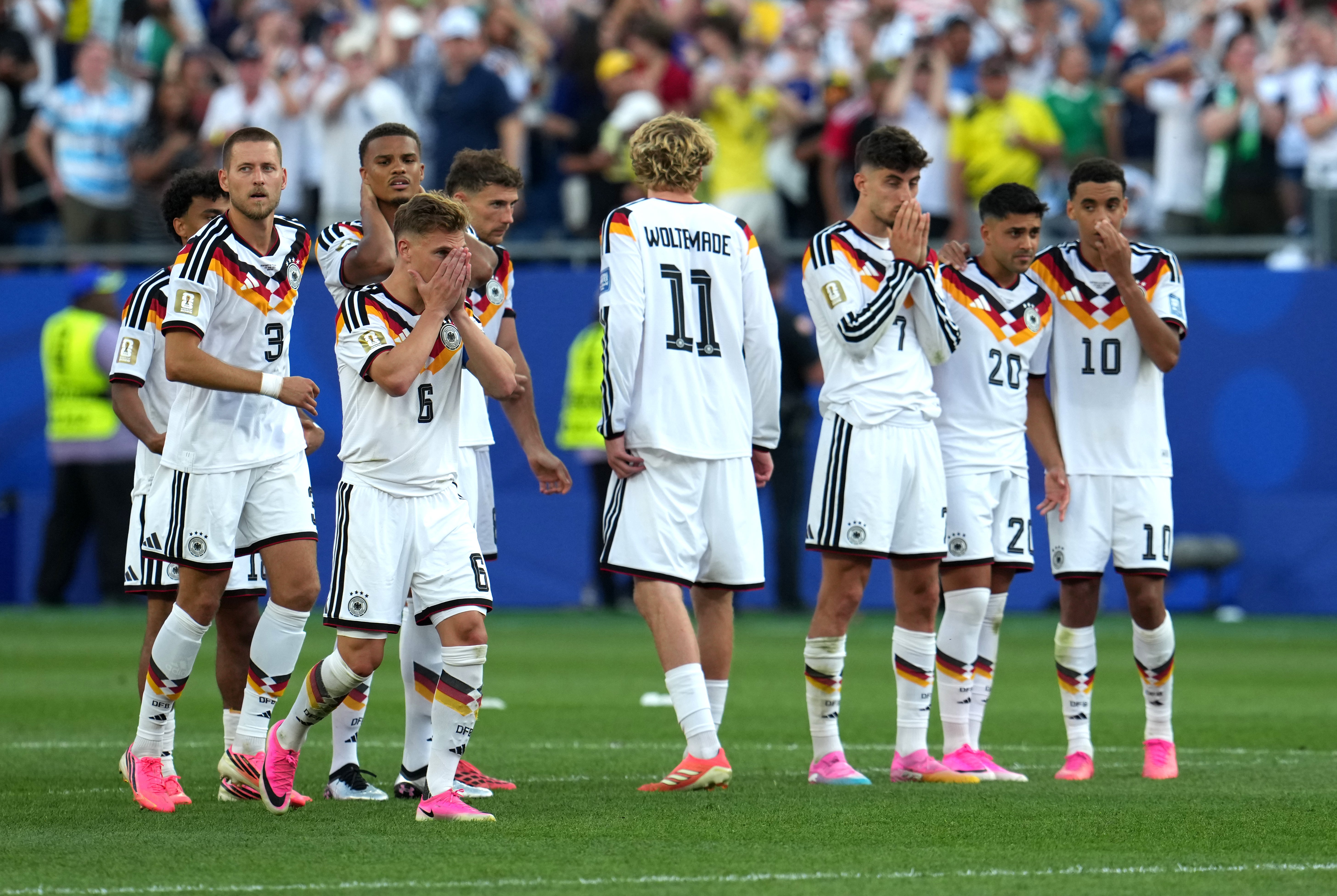 Germany appear dejected after Jonathan Tah misses a penalty